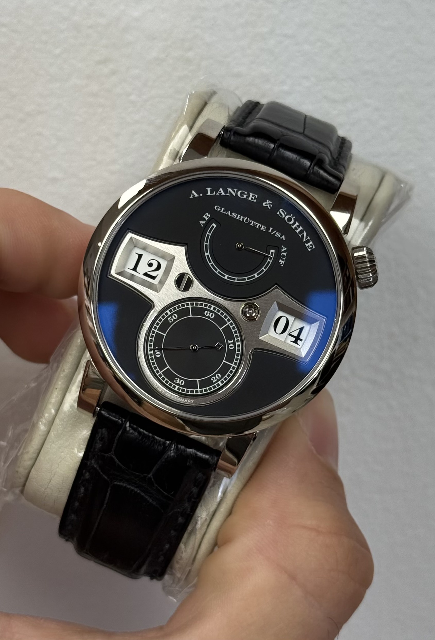 May be an image of digital watch and text
