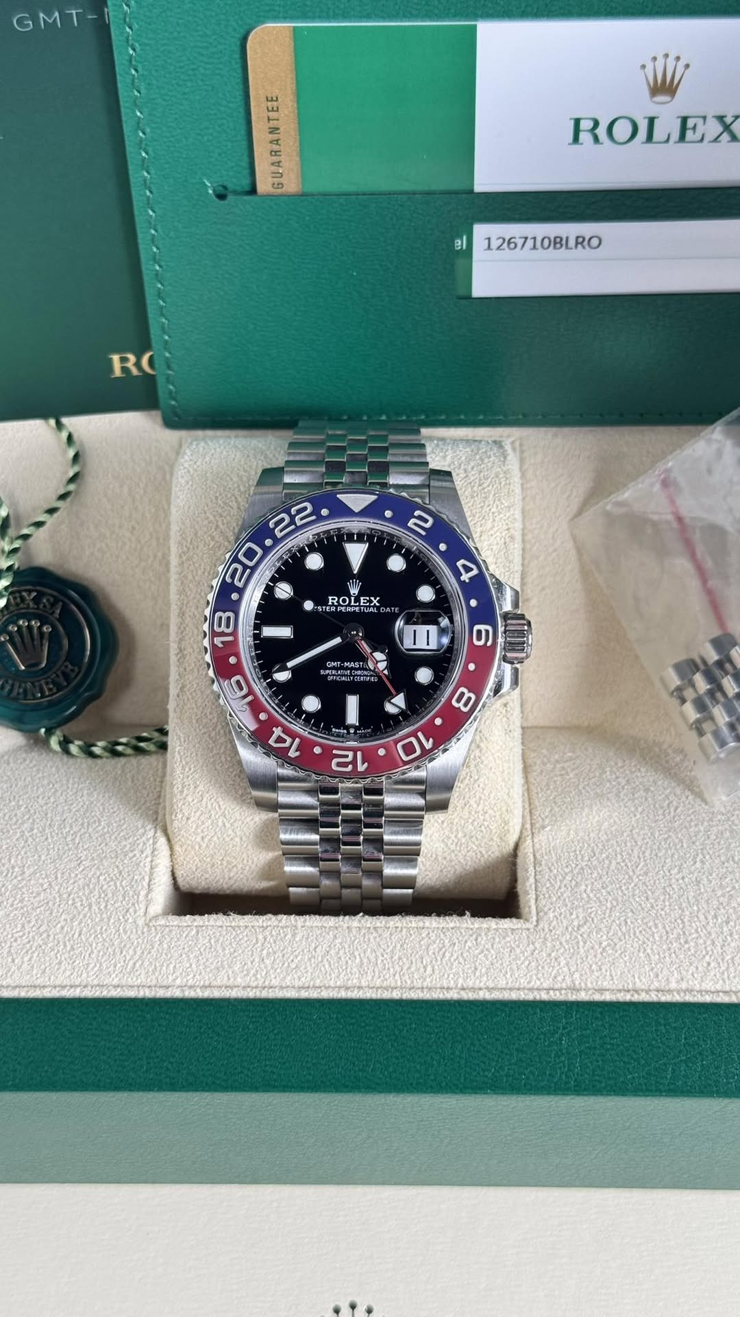 May be an image of wrist watch and text