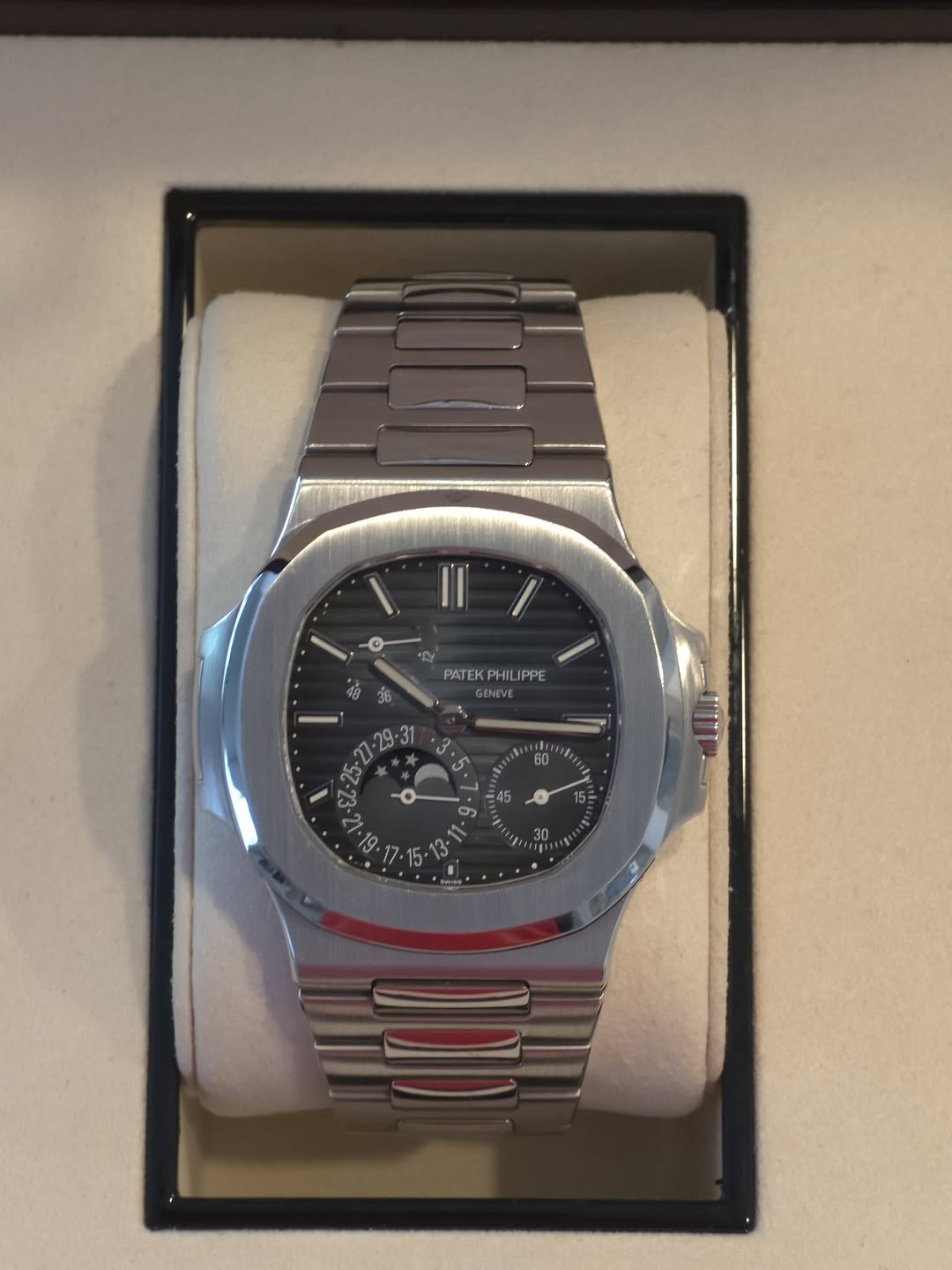 May be an image of wrist watch and text that says '0 PATEK PATEKPHIL KP PHI PPE 45 แแฌ 15='