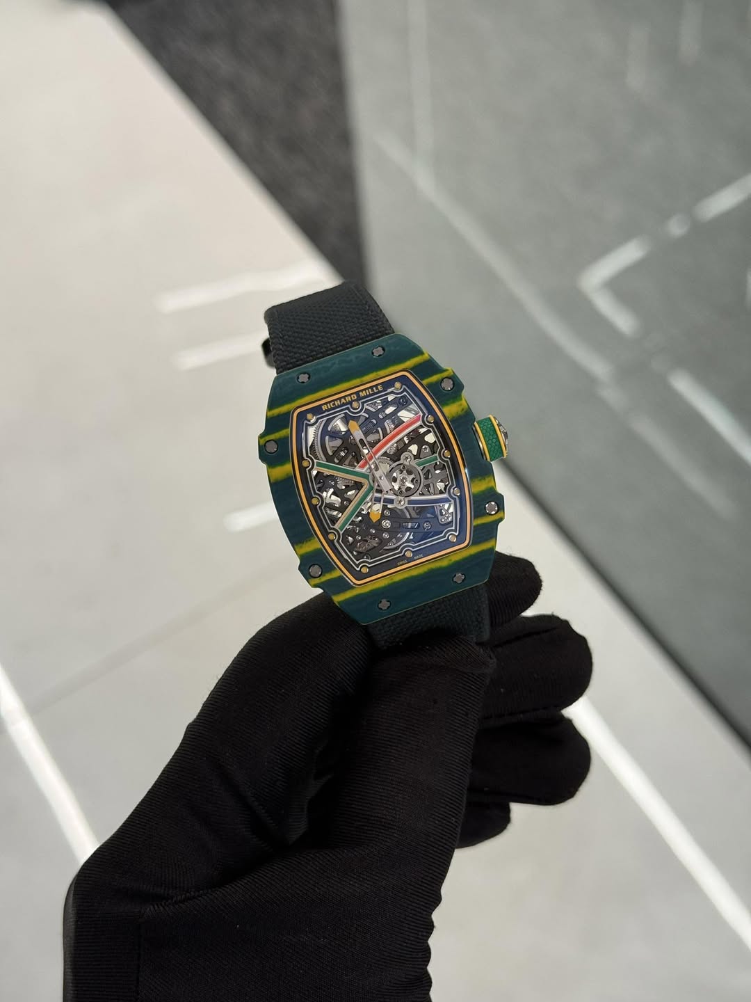 May be an image of digital watch and text that says 'MILLK RICHANO 科 i + 1 1 A 9 ف'