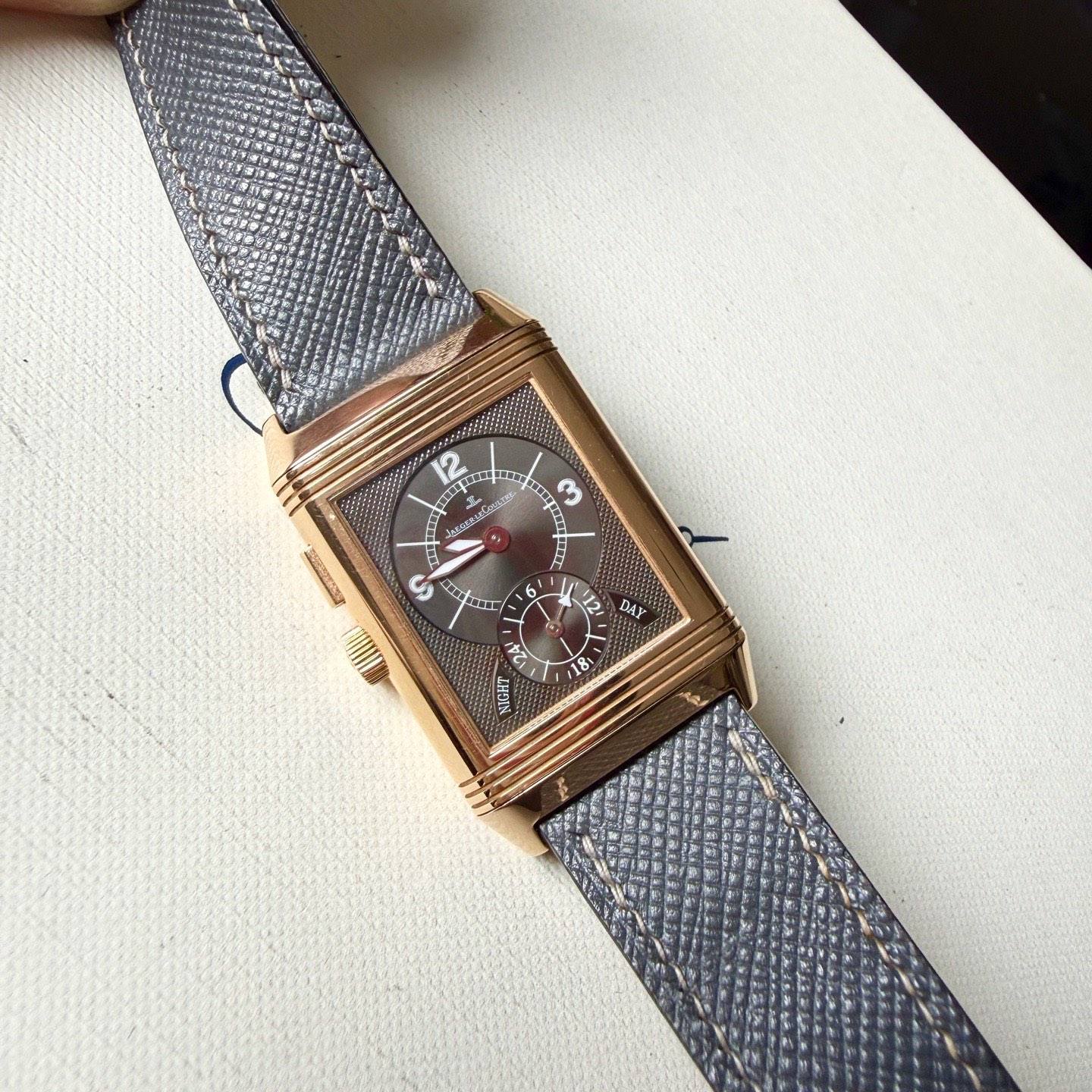 May be an image of leather, wrist watch and text