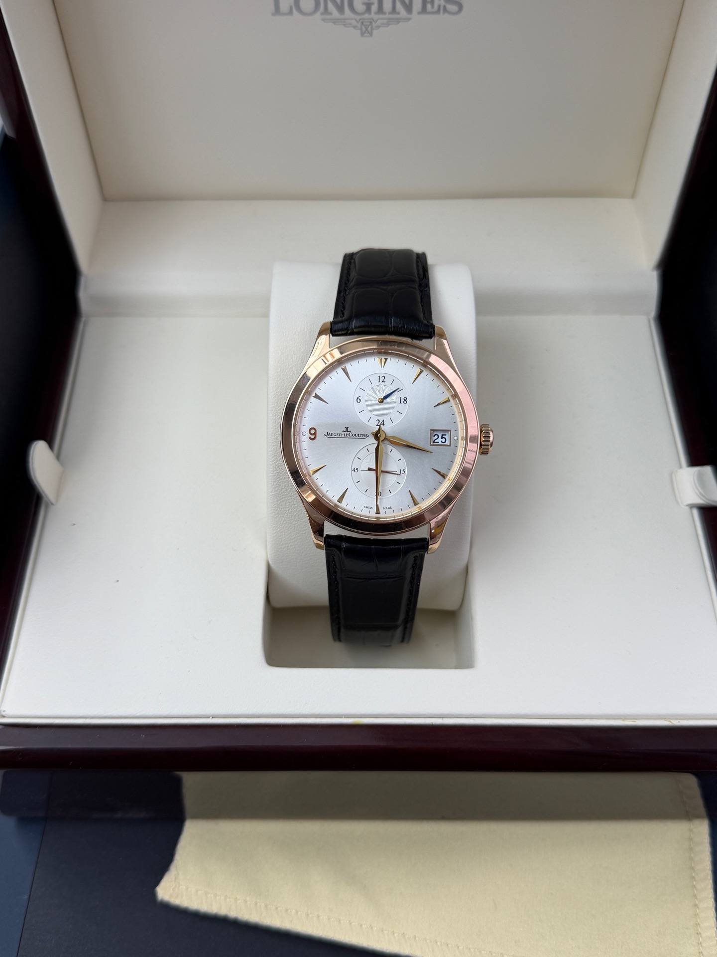 May be an image of wrist watch and text