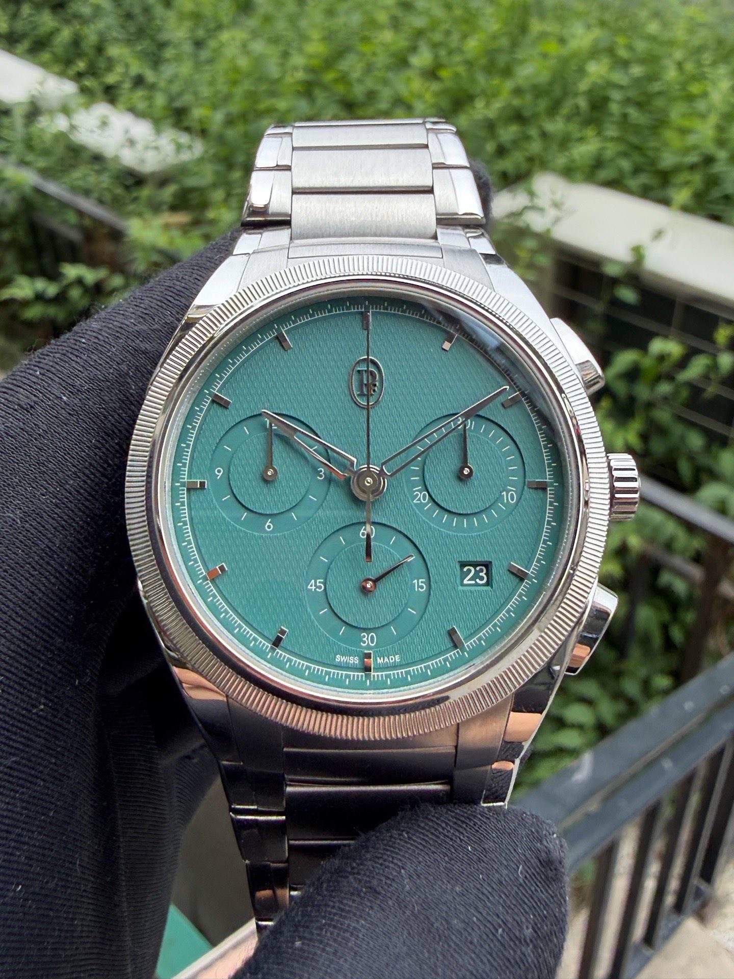 May be an image of wrist watch and text