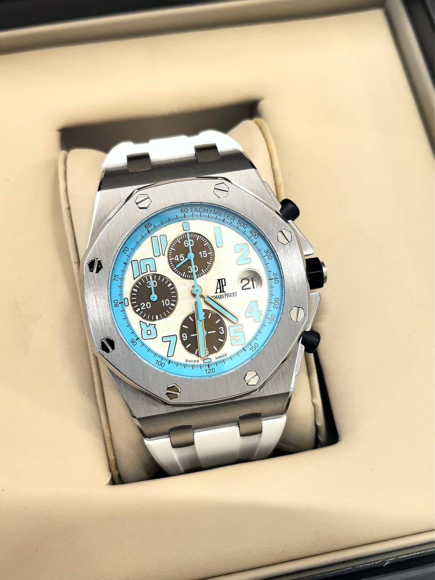May be an image of wrist watch and text