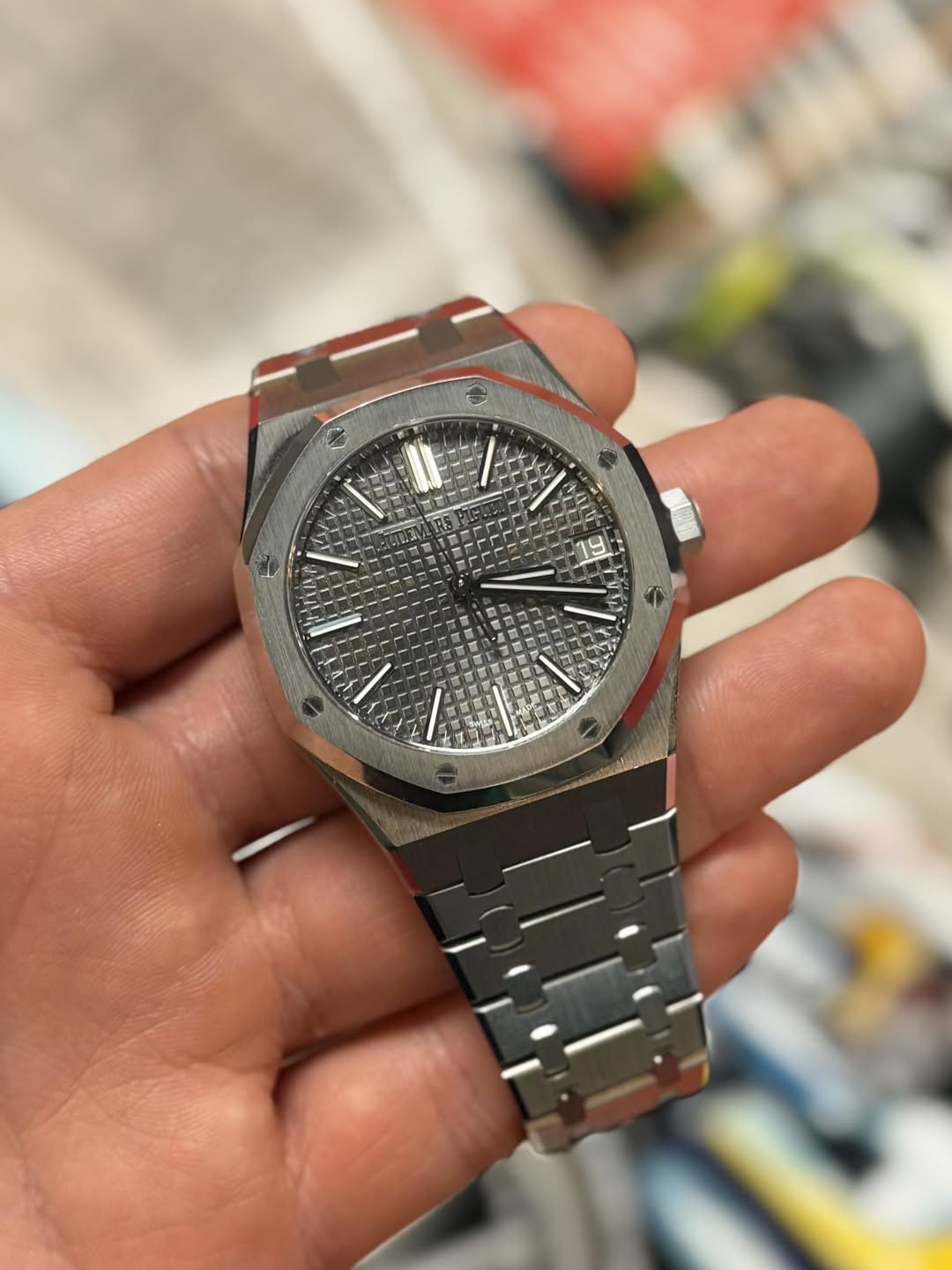 May be an image of wrist watch and text that says 'A'