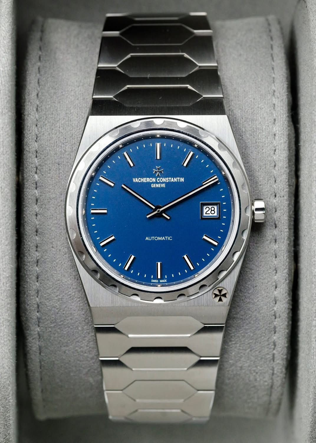 May be an image of wrist watch and text that says 'l' VACHERON VACHERONCONSTANTIN ON CONSTANTIN GENEVE I' 28 AΙ AUTOMATIC ١ 1 SNES ADE KADE'