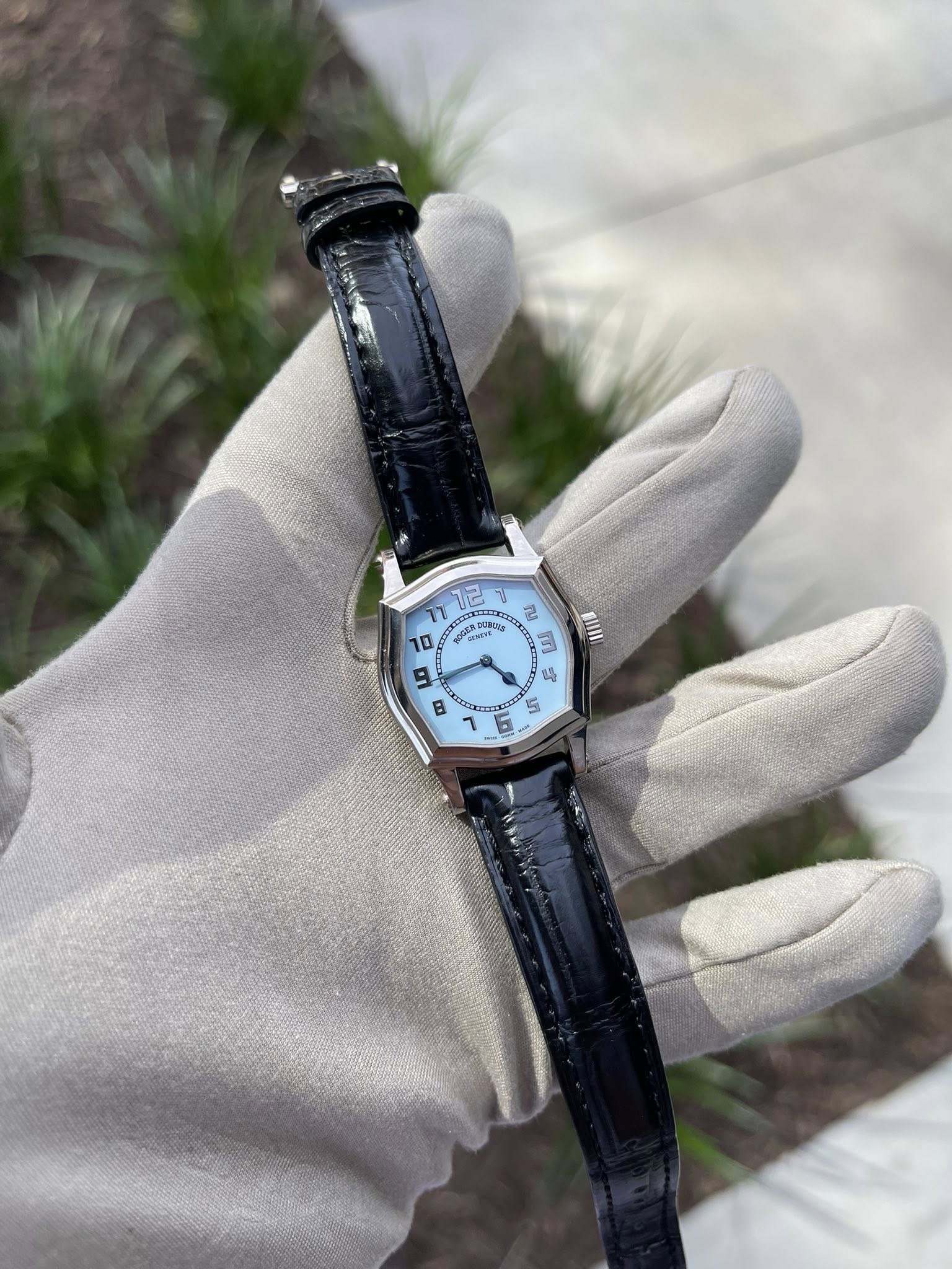 May be an image of wrist watch