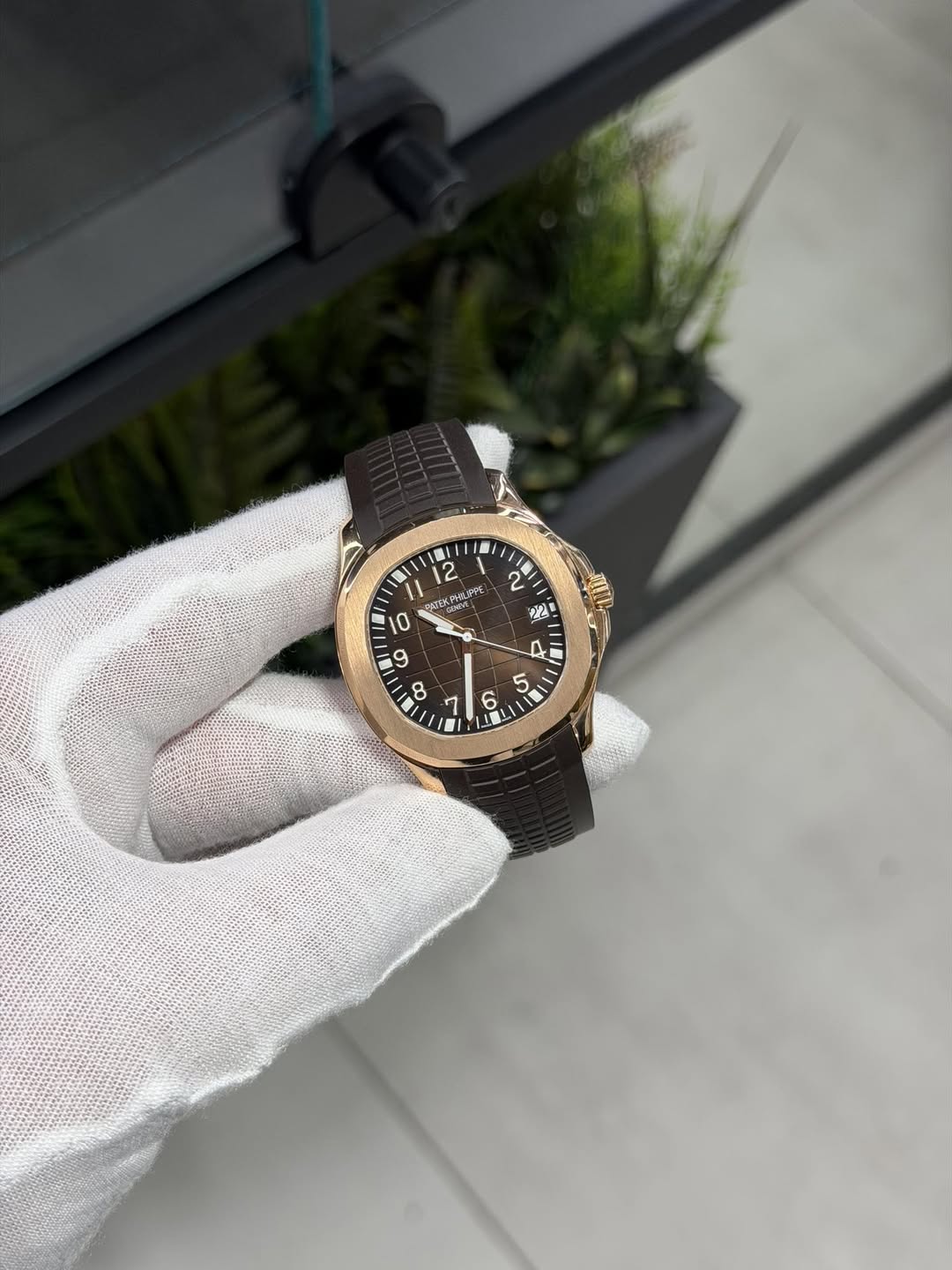May be an image of wrist watch and text