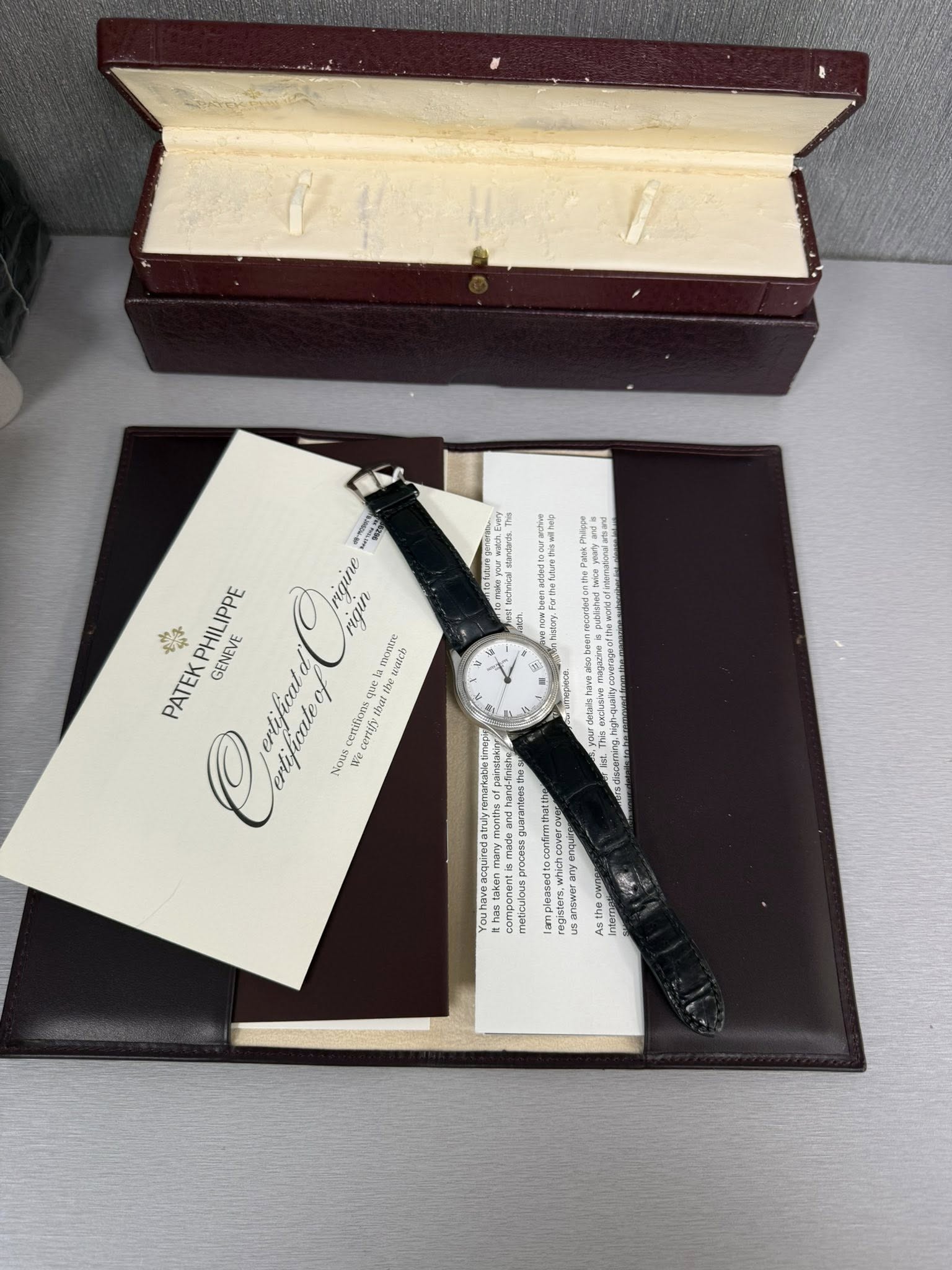 May be an image of wrist watch and text