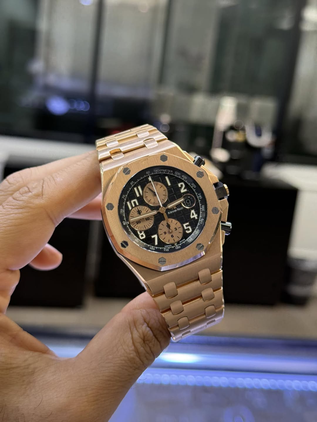 May be an image of wrist watch and text