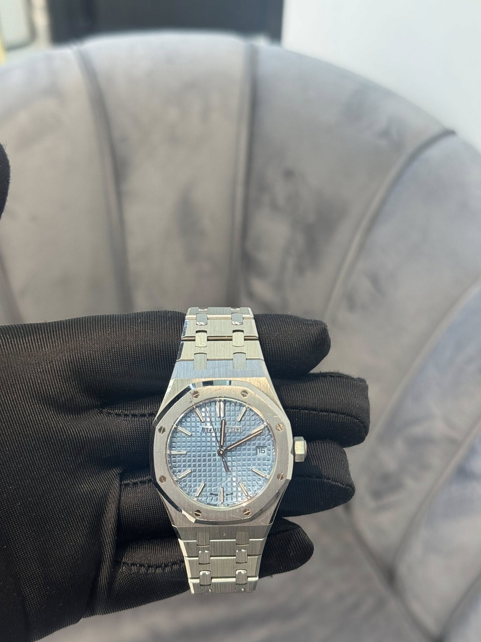 May be an image of wrist watch and text