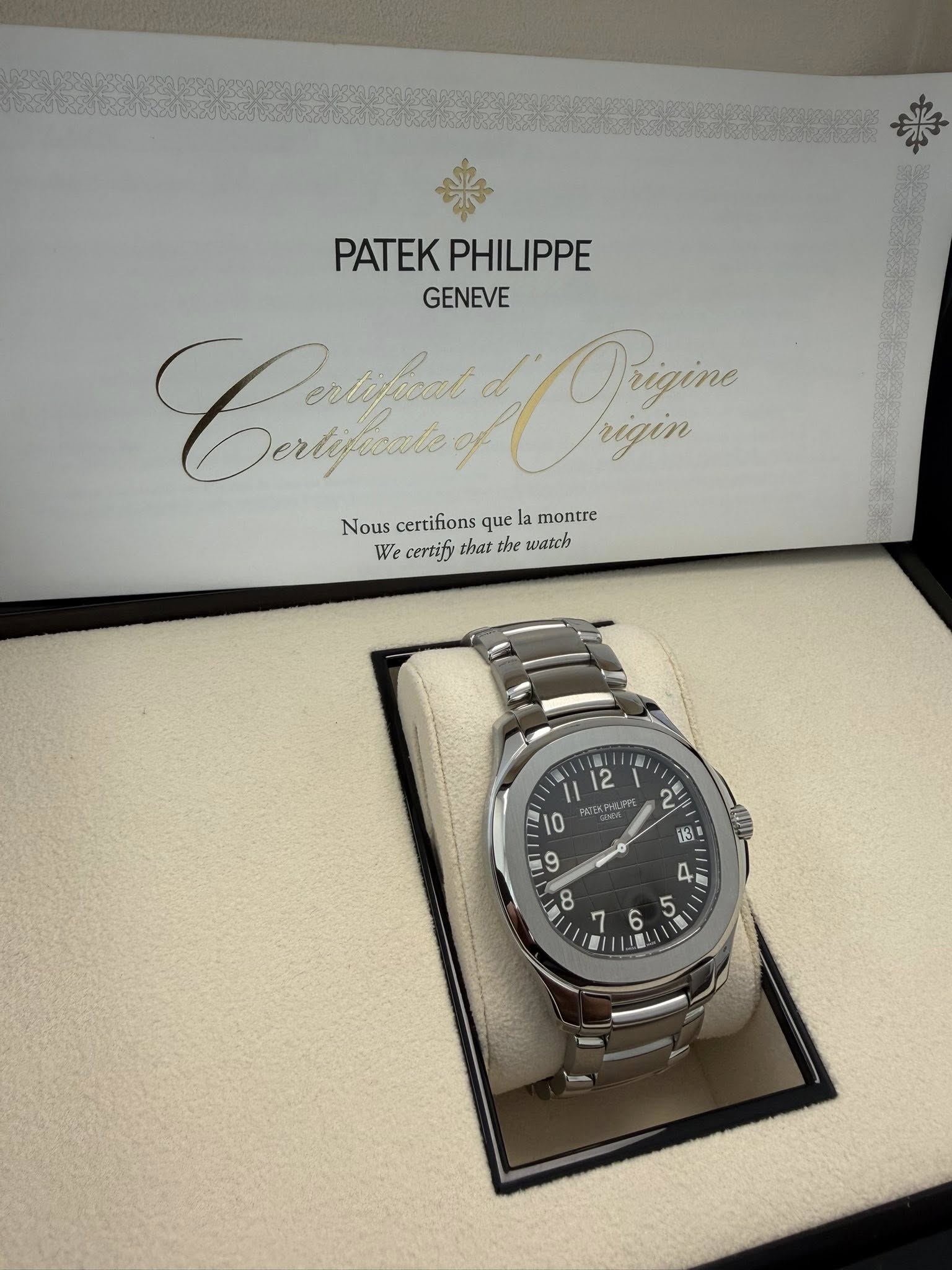 May be an image of wrist watch and text that says 'PATEK PHILIPPE GENEVE CиpAoH Cai Oregin Prizine rigin Nous certifions que la montre We certify that the watch 11 12 E 0 የግክቢቃ ማፍ!…