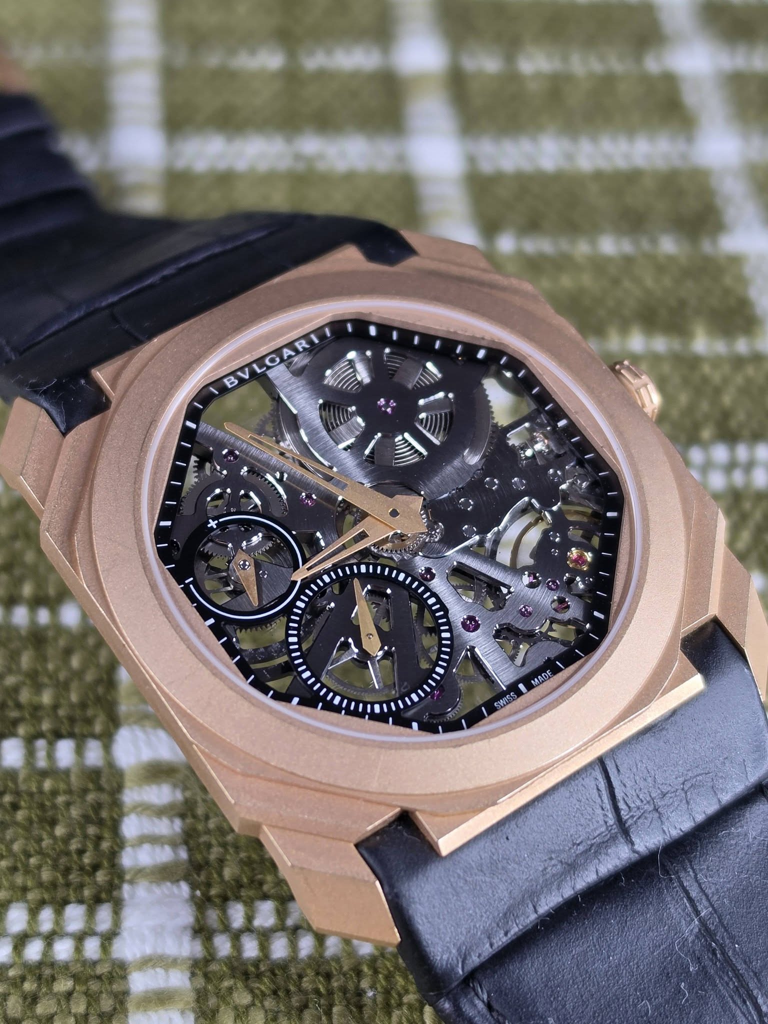 May be an image of wrist watch and text