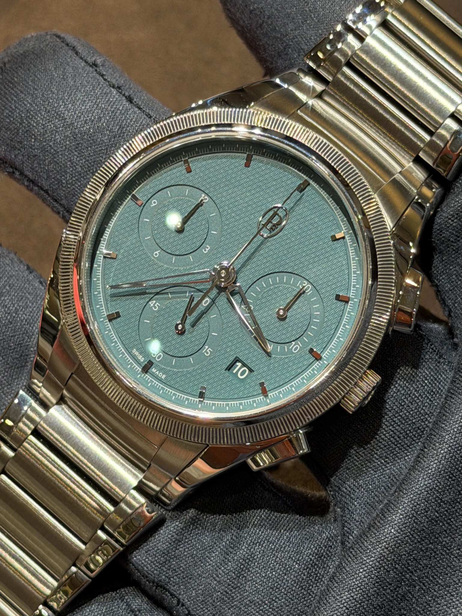 May be an image of wrist watch and text