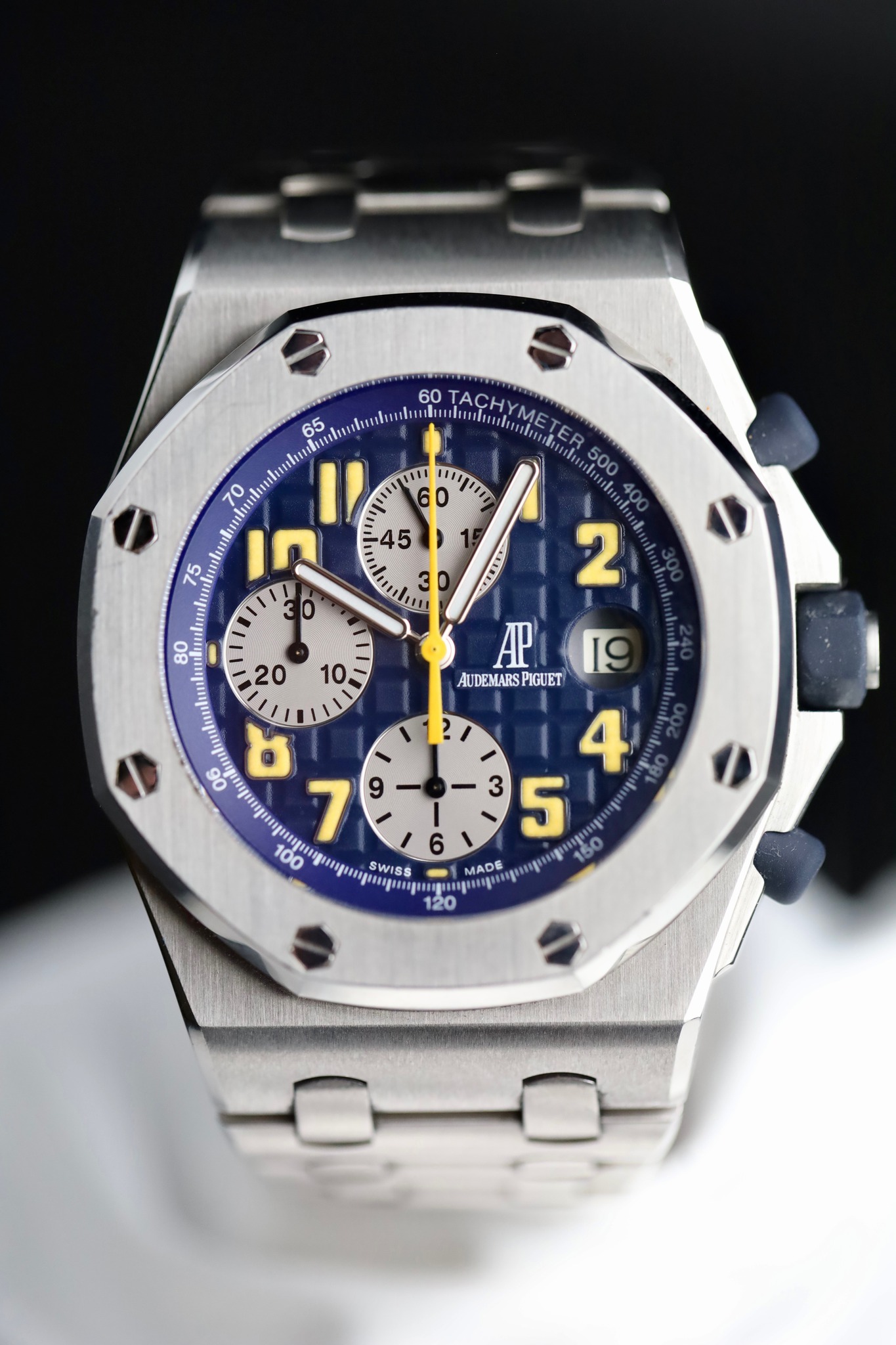 May be an image of wrist watch and text