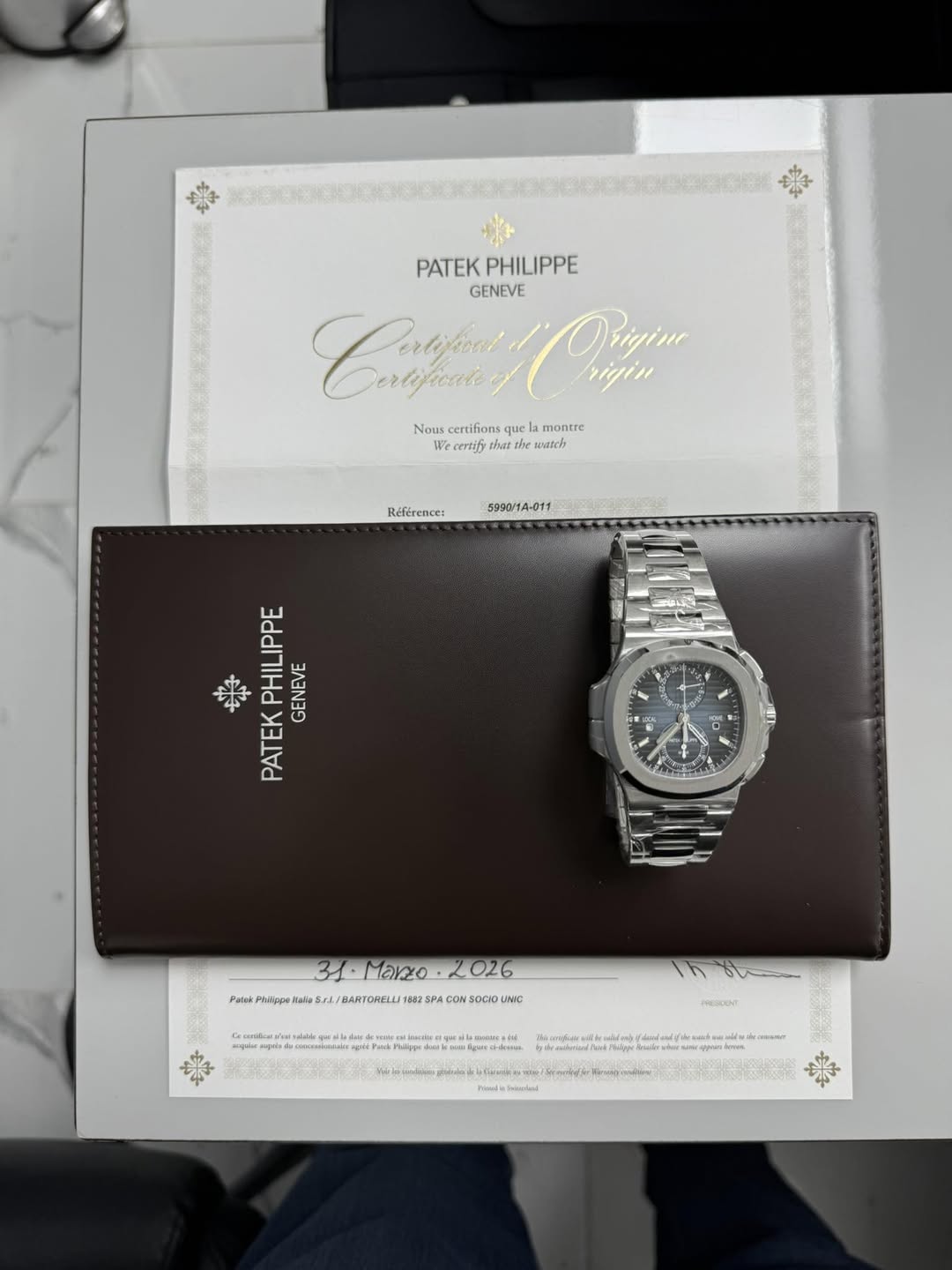 May be an image of wrist watch and text