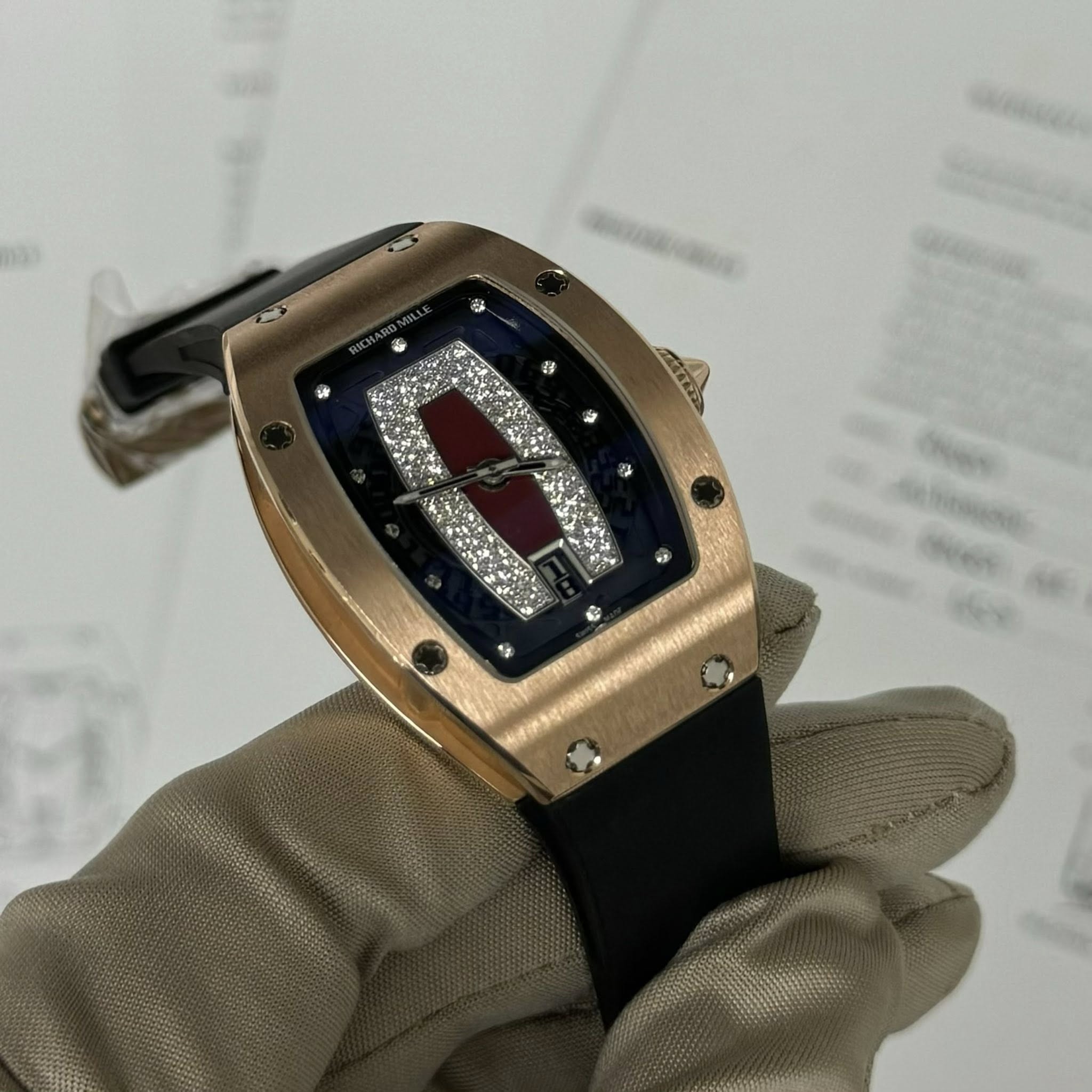 May be an image of wrist watch and text