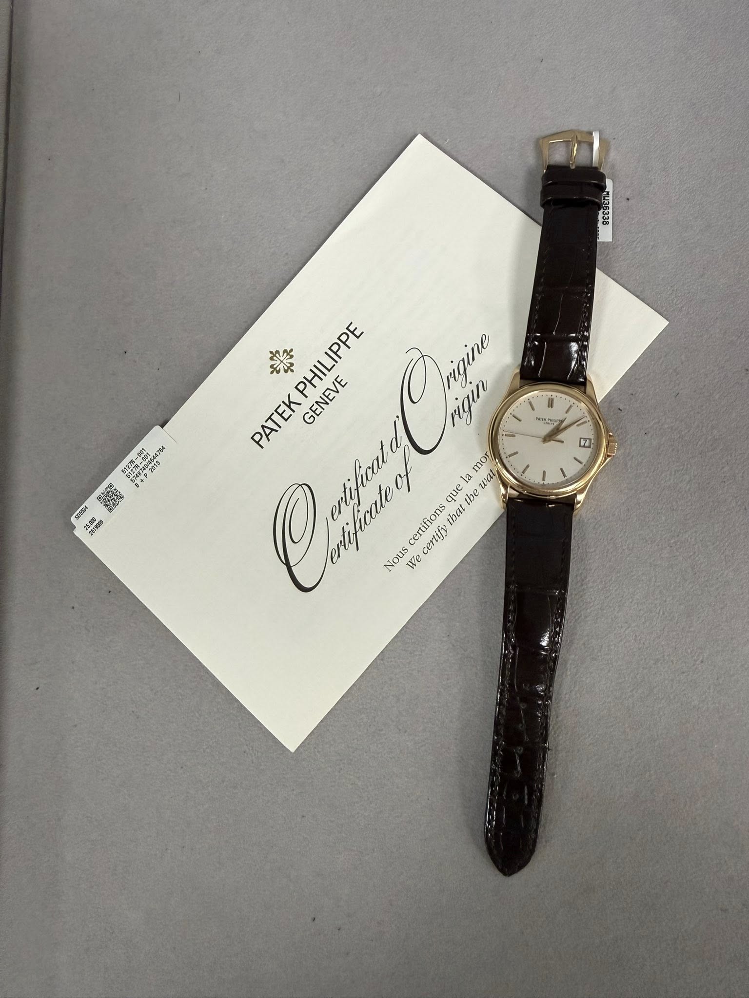 May be an image of wrist watch and text that says '" 0ま 2012 メッンン B Ocфpи the ንዳ leaa weat PATEKPHILIPPE 樂 PHILIPPE Castang PATEK GENEVE rigin m mor uel la certifions that certijy…