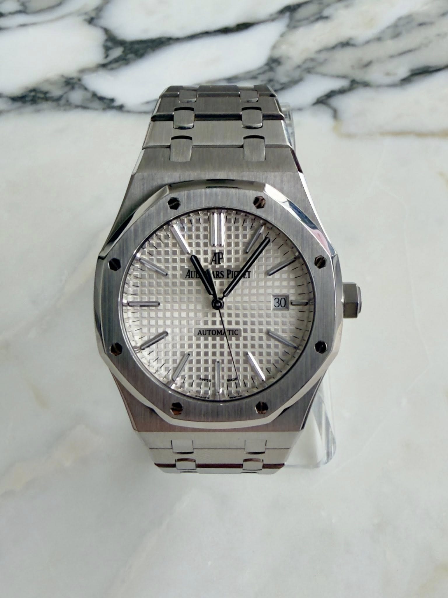 May be an image of wrist watch