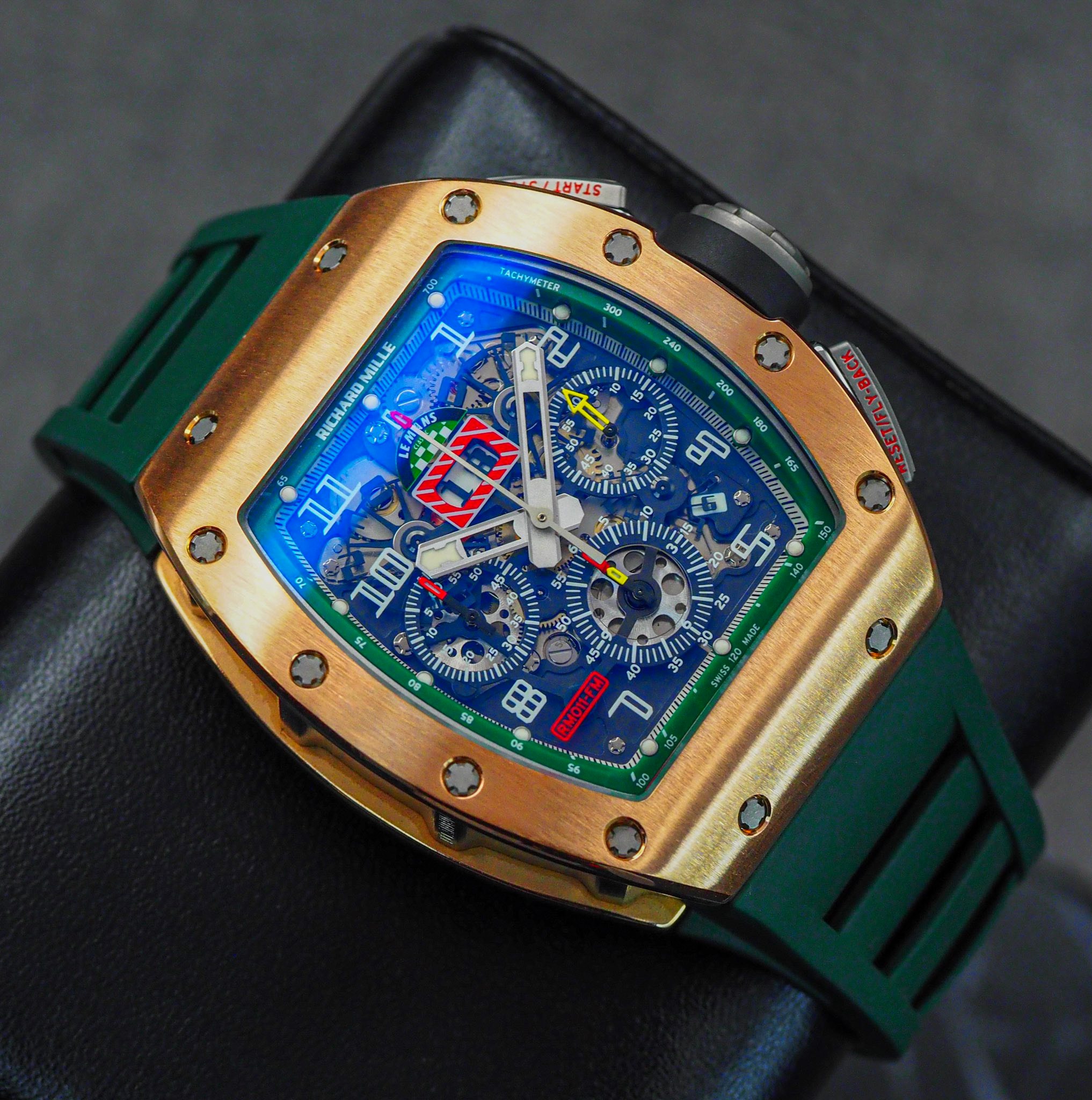 May be an image of wrist watch and text