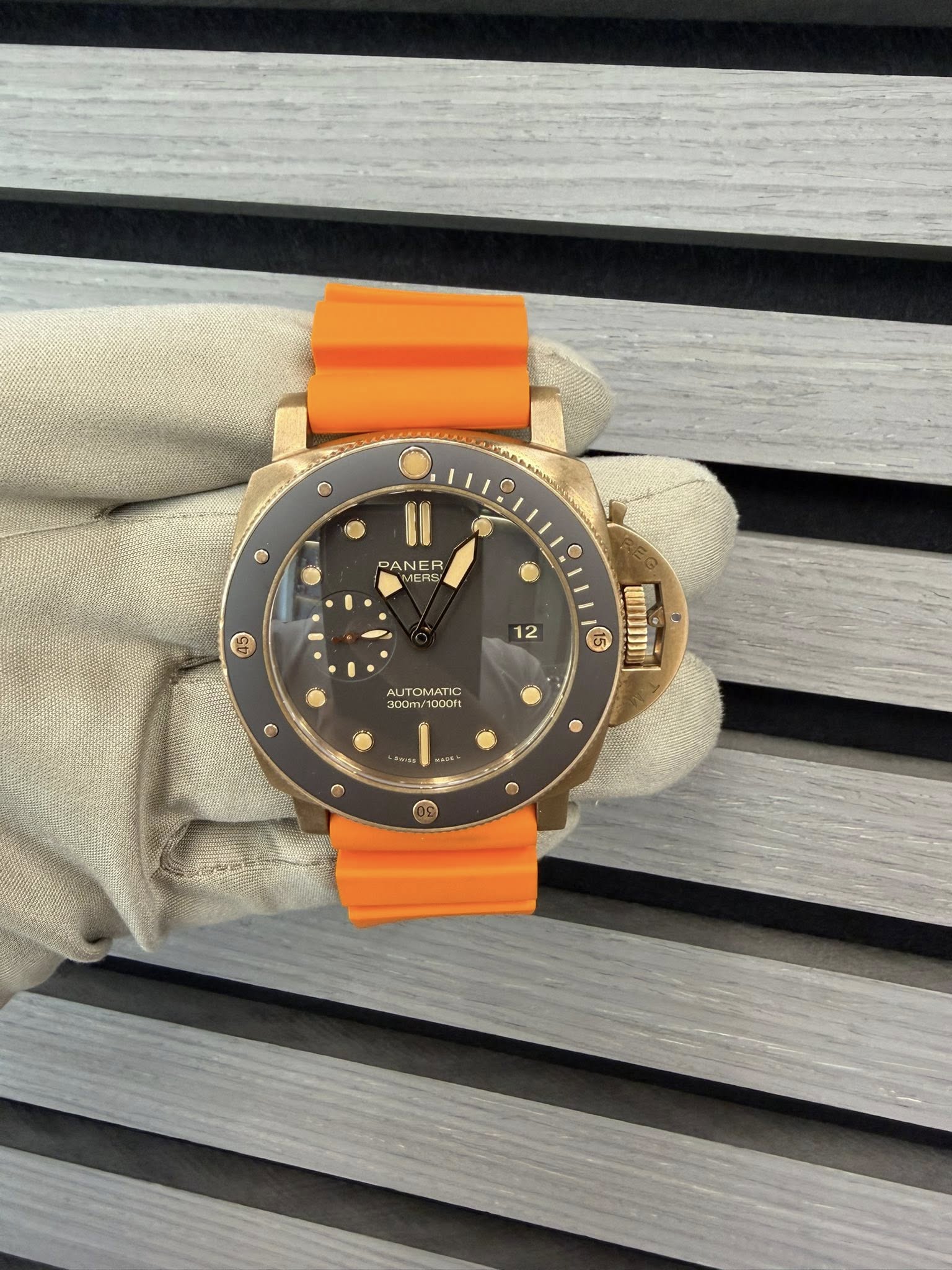 May be an image of wrist watch and text