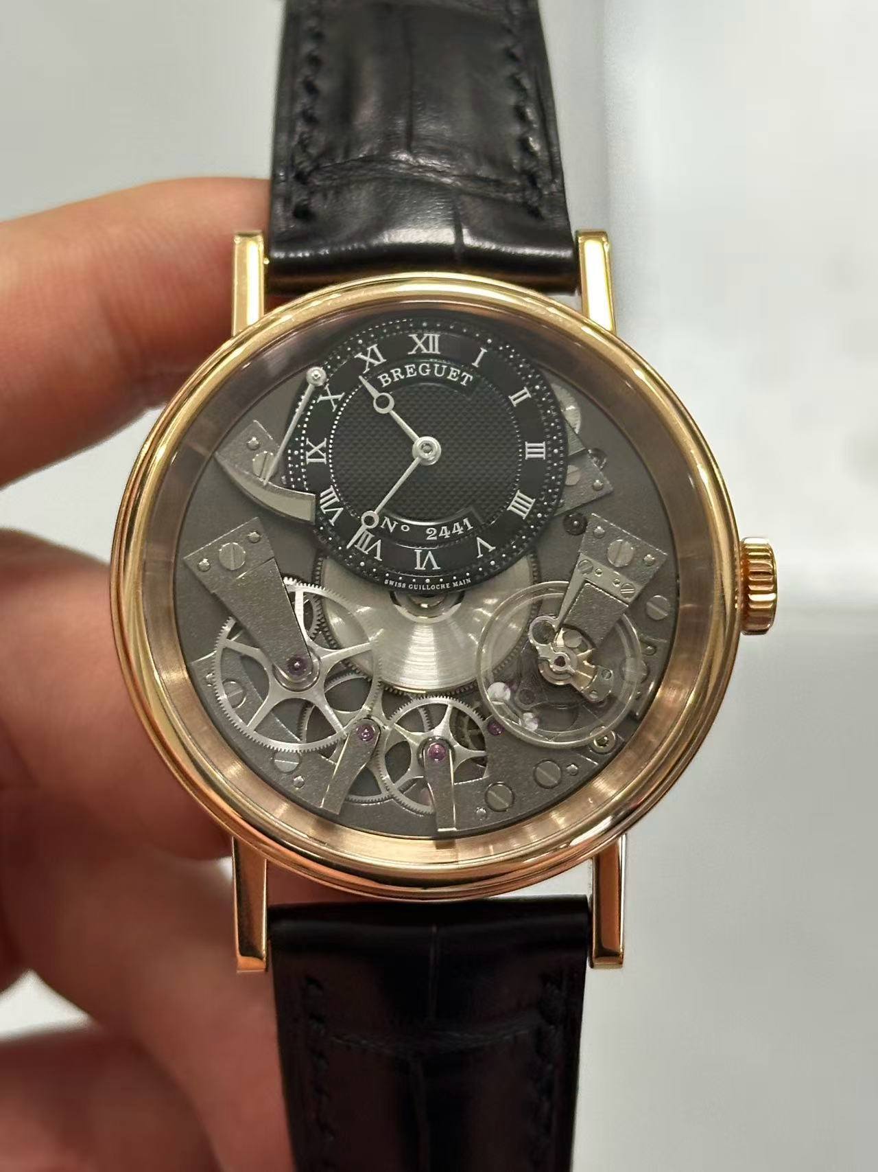 May be an image of wrist watch and text that says 'XI BREGUET XII I II II Tu IIII nA NO244 NO 244 I M ச்ட்க்ட CNE AMT'