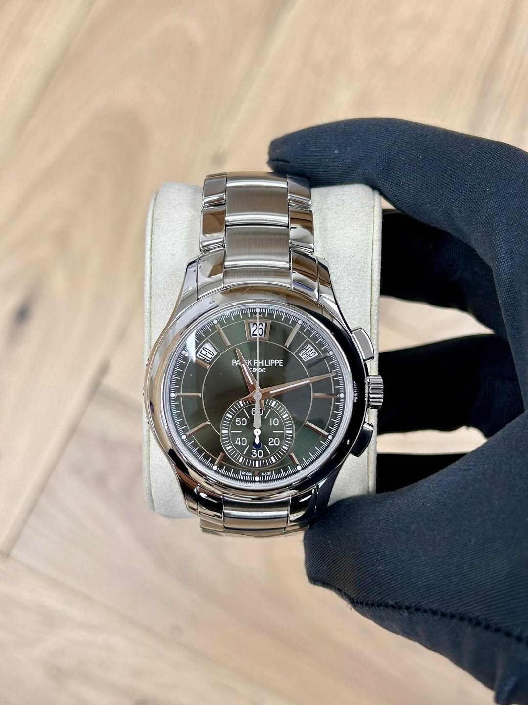 May be an image of wrist watch and text