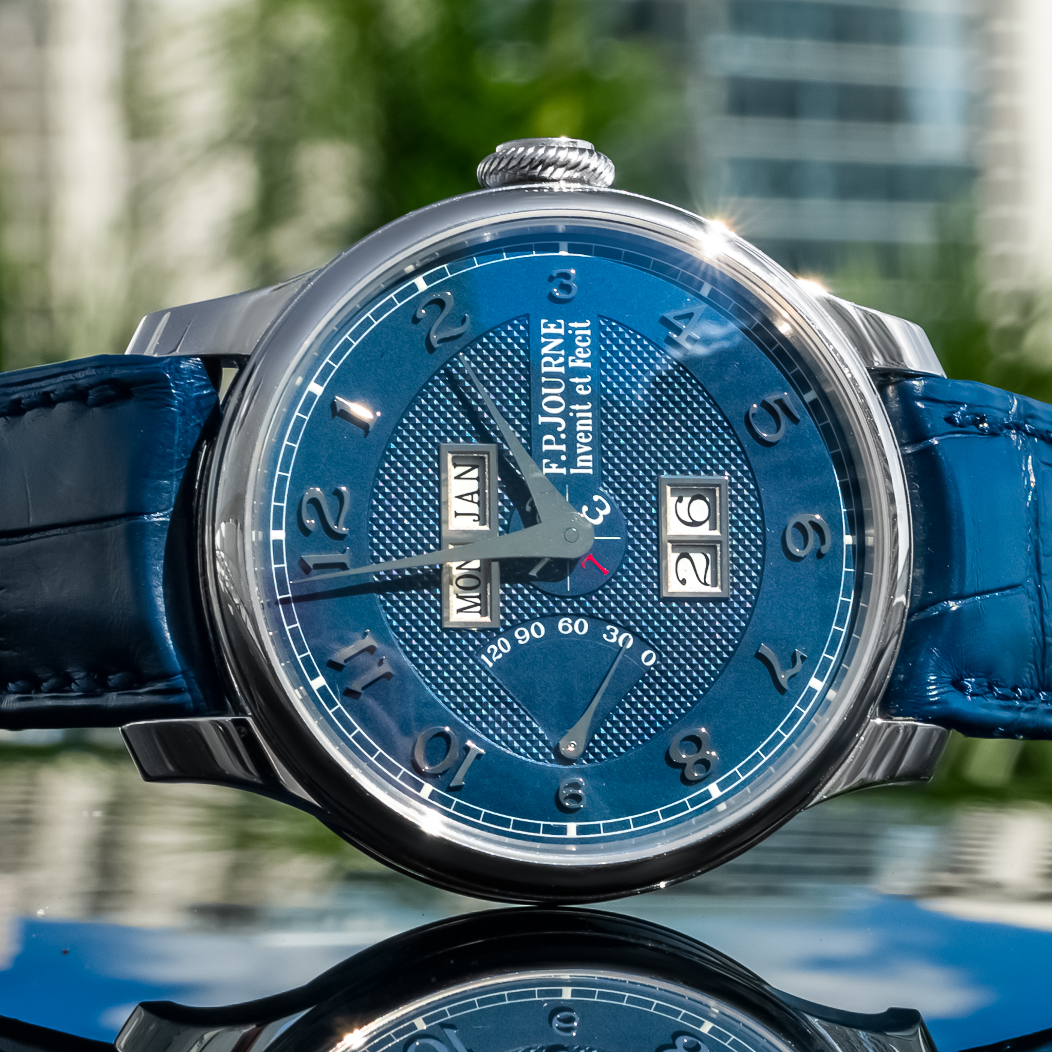 May be an image of wrist watch and text