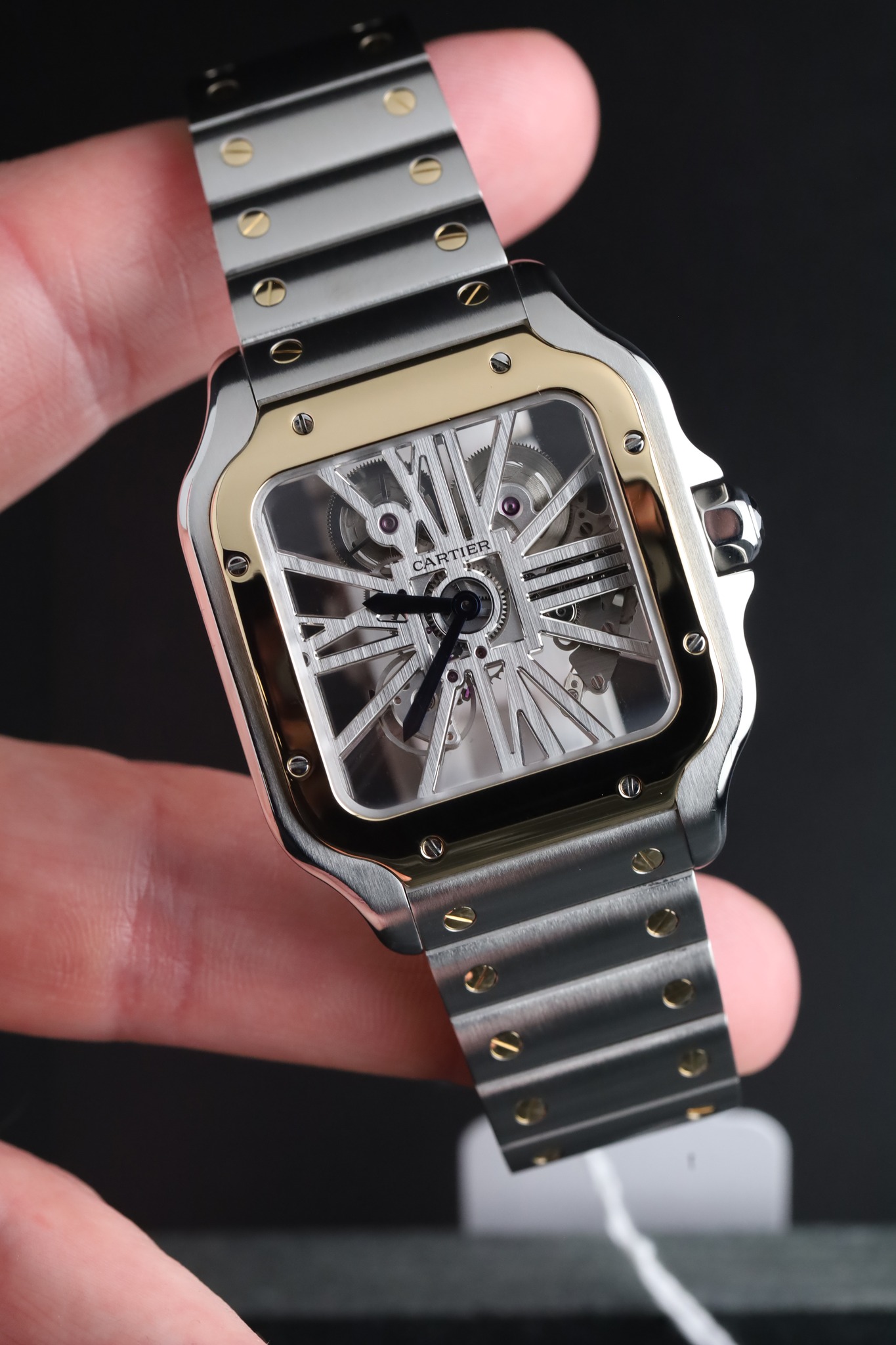 May be an image of digital watch and text that says 'لم y আর 아동 CARTIER'
