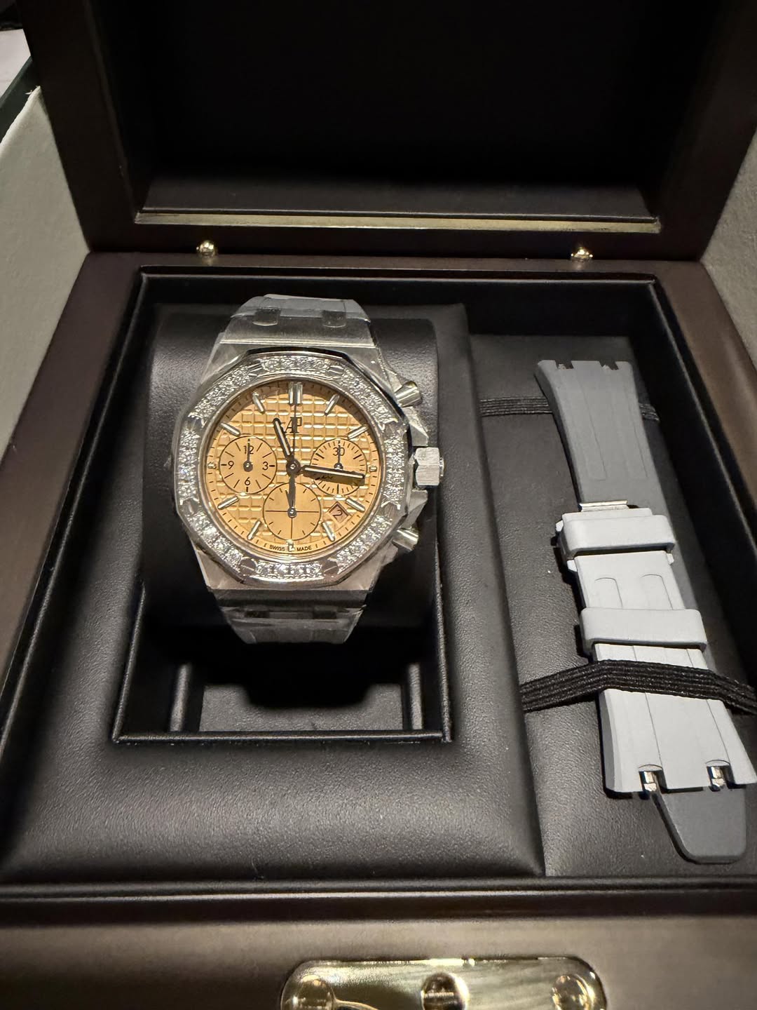 May be an image of wrist watch and text