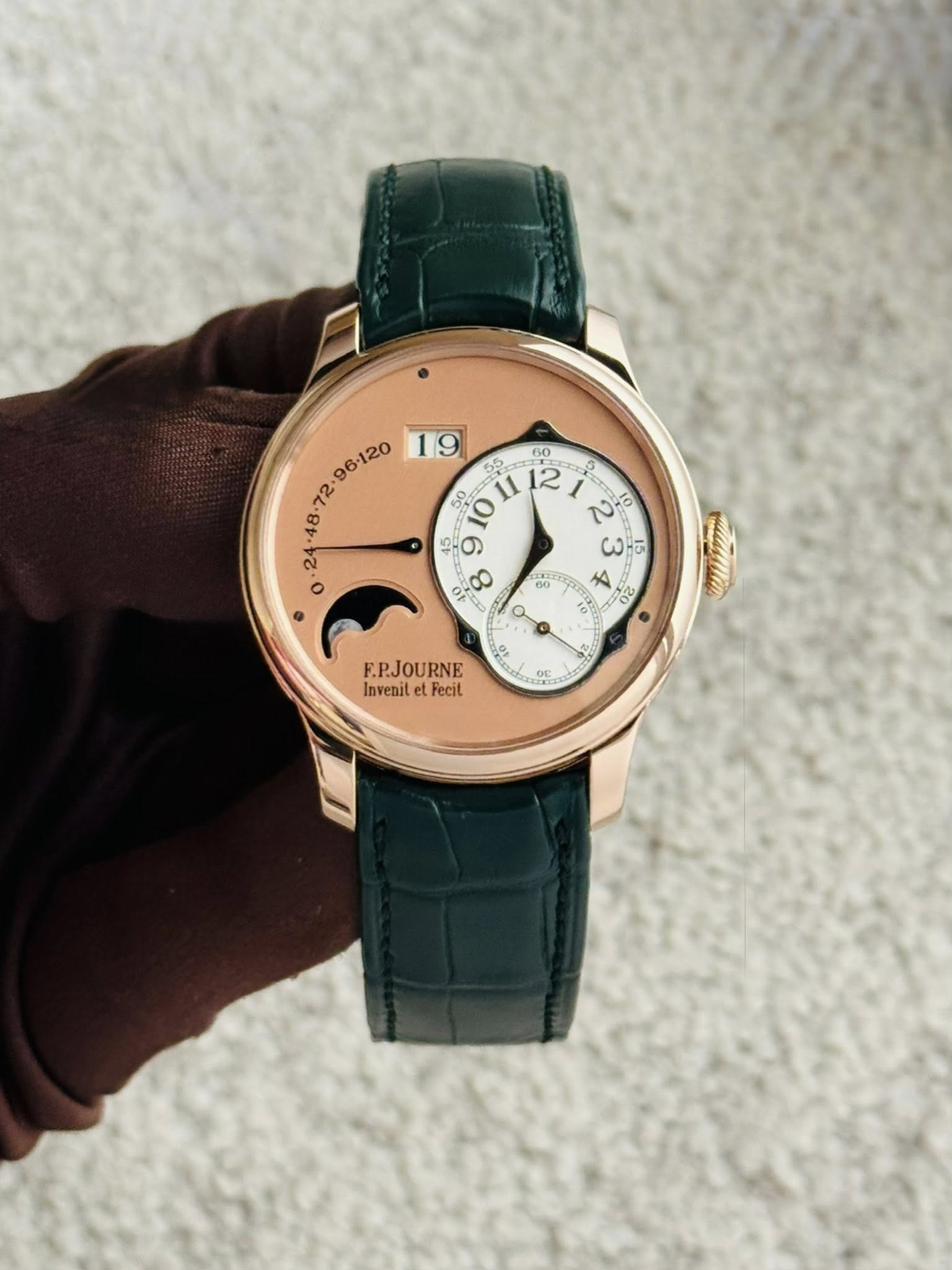 May be an image of wrist watch and text