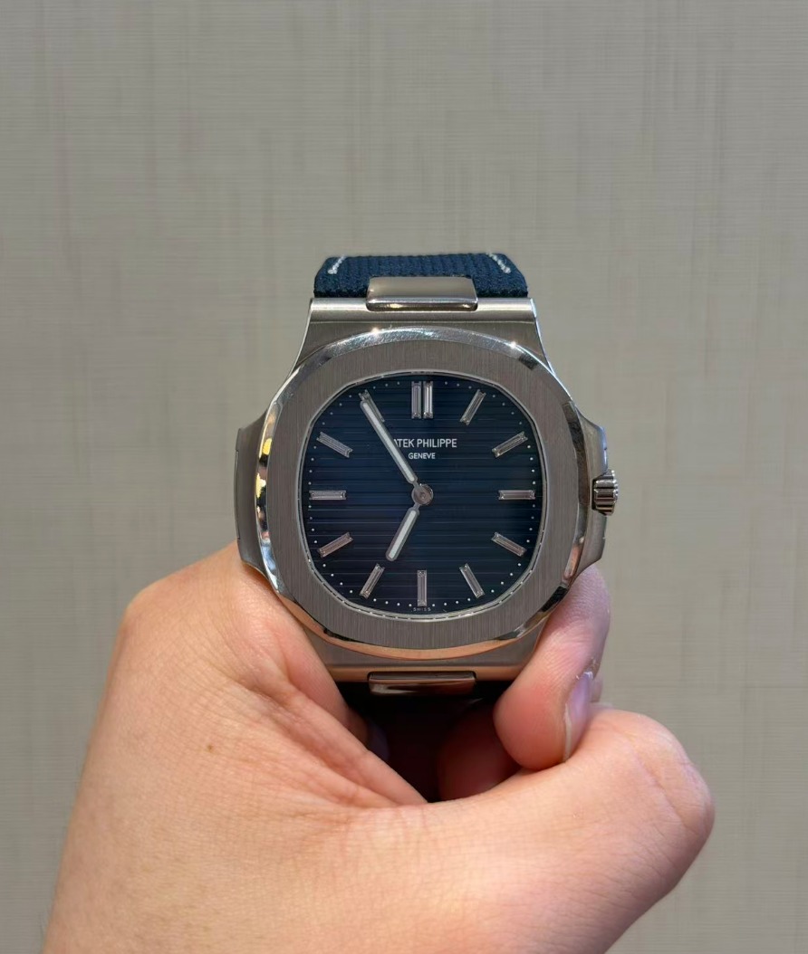 May be an image of wrist watch and text that says 'TEKPHILIPPE TEK PHILIPP NEVE'