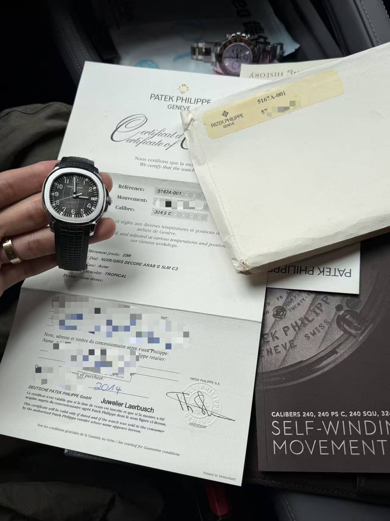 May be an image of digital watch, ticket stub and text