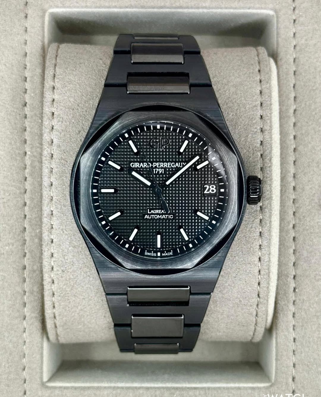 May be an image of wrist watch and text that says 'GIRARD GIRAR-PERREGAUY -PERREGAUY 1791 28 LAUREA: Α 4 รพธ์ร ŚsMADE MADE'