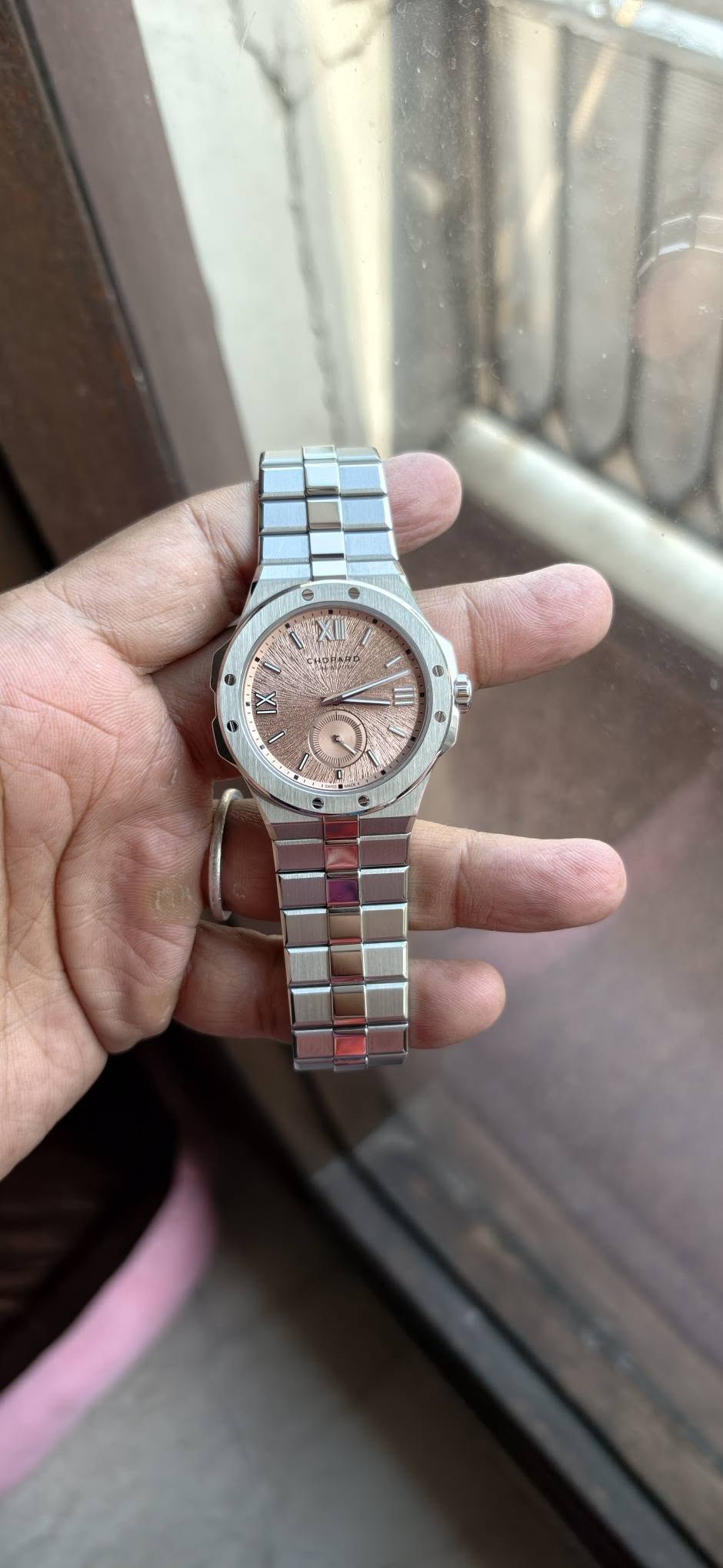 May be an image of digital watch and text