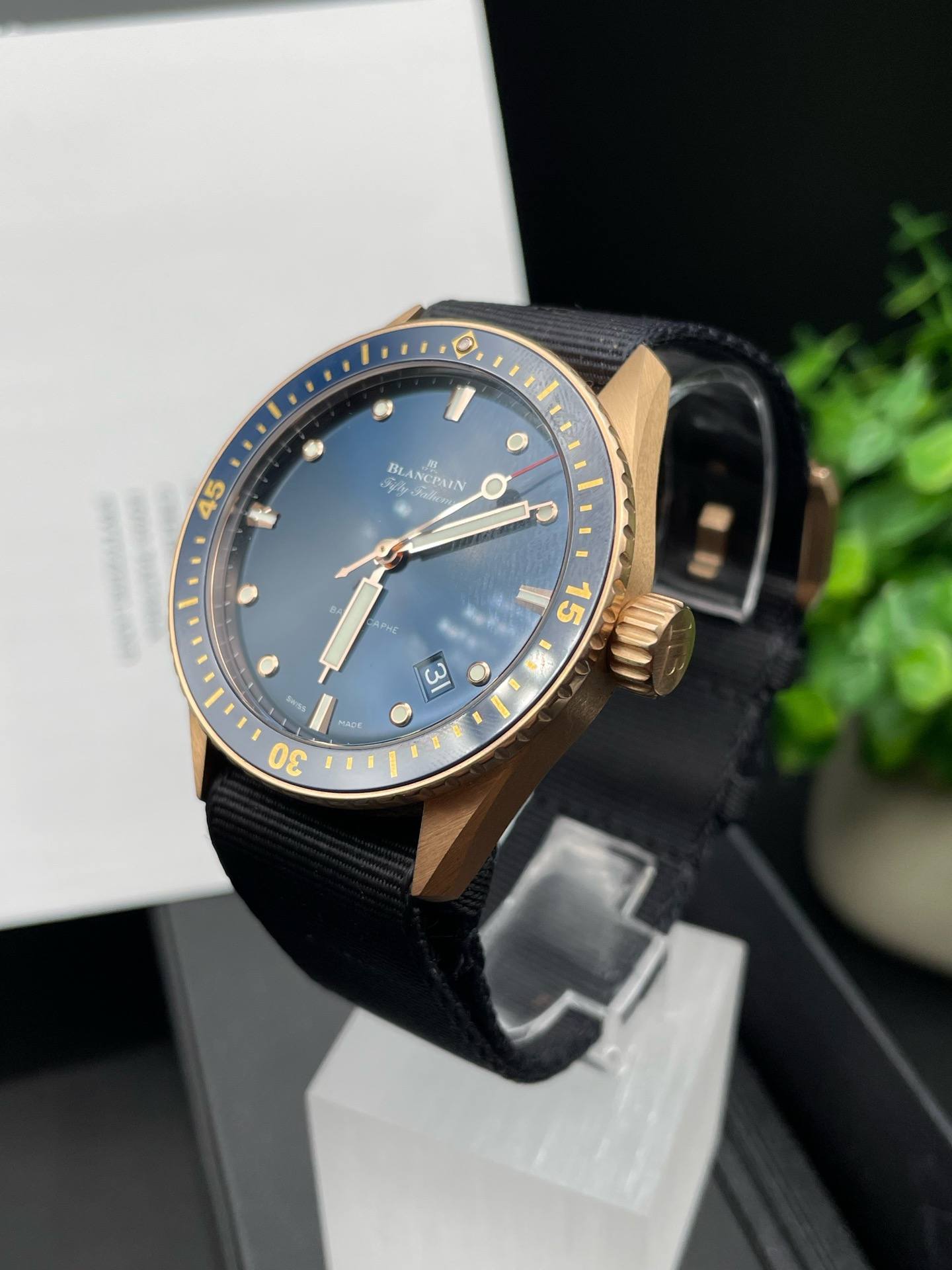 May be an image of wrist watch and text
