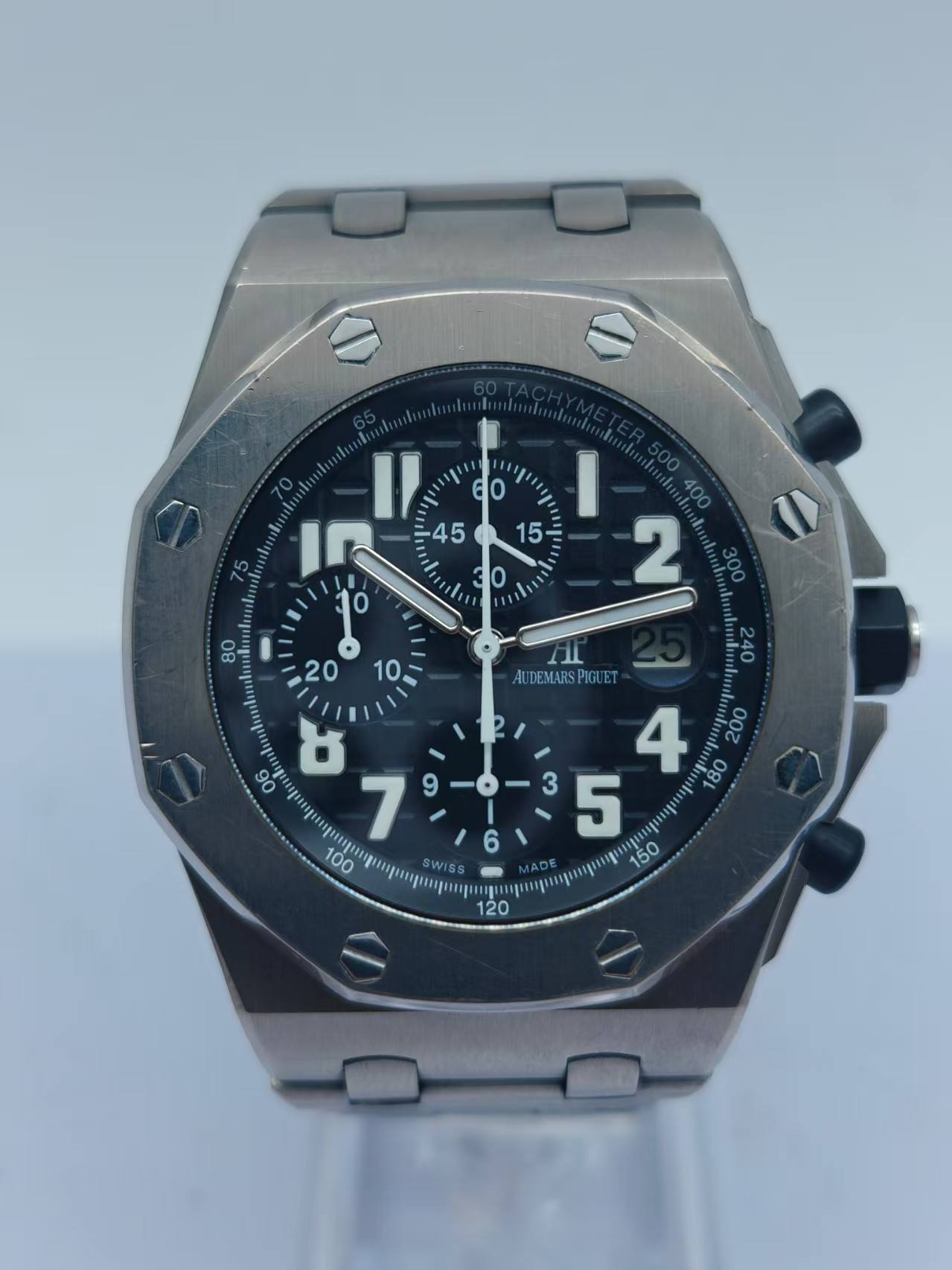 May be an image of wrist watch and text