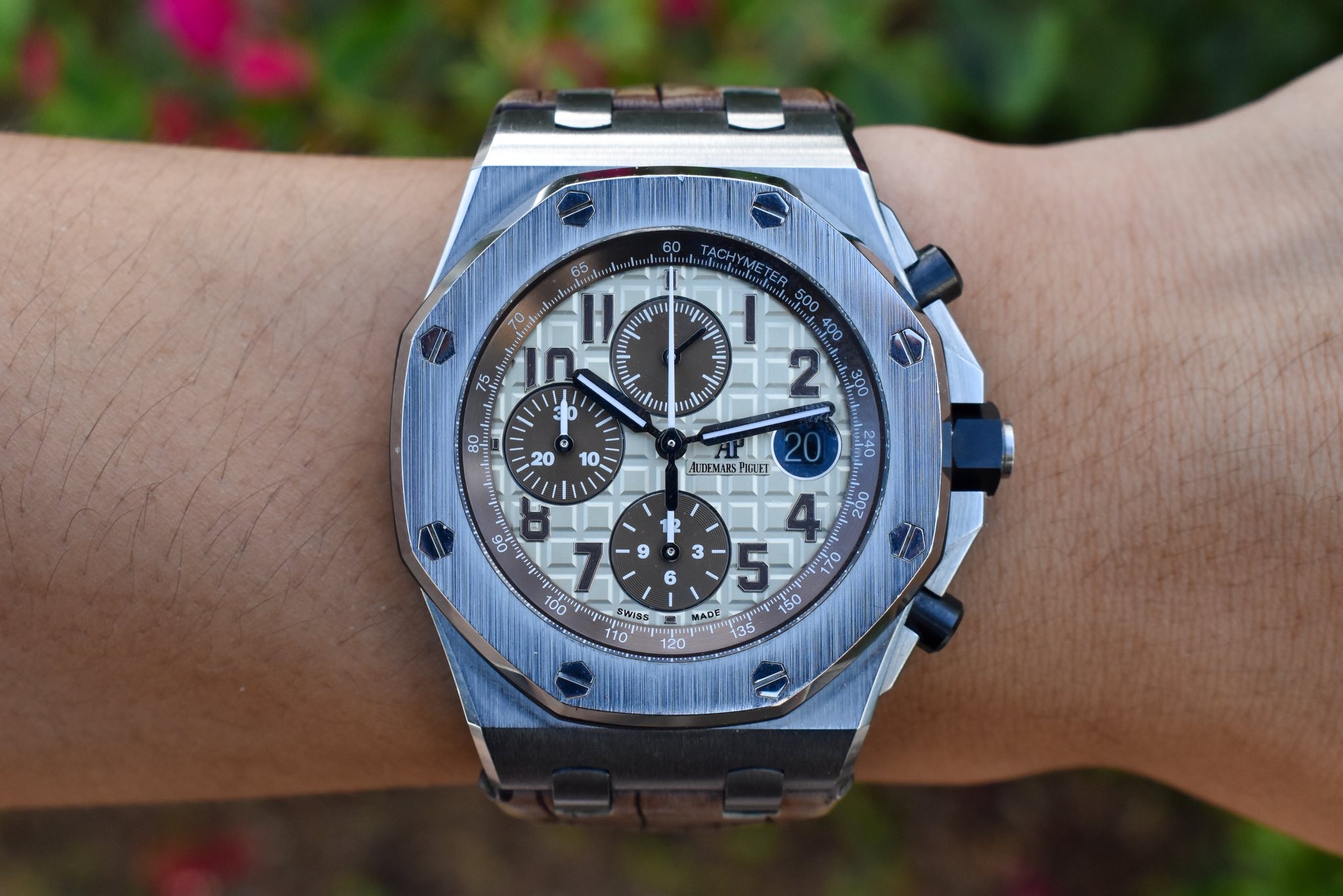 May be an image of wrist watch and text