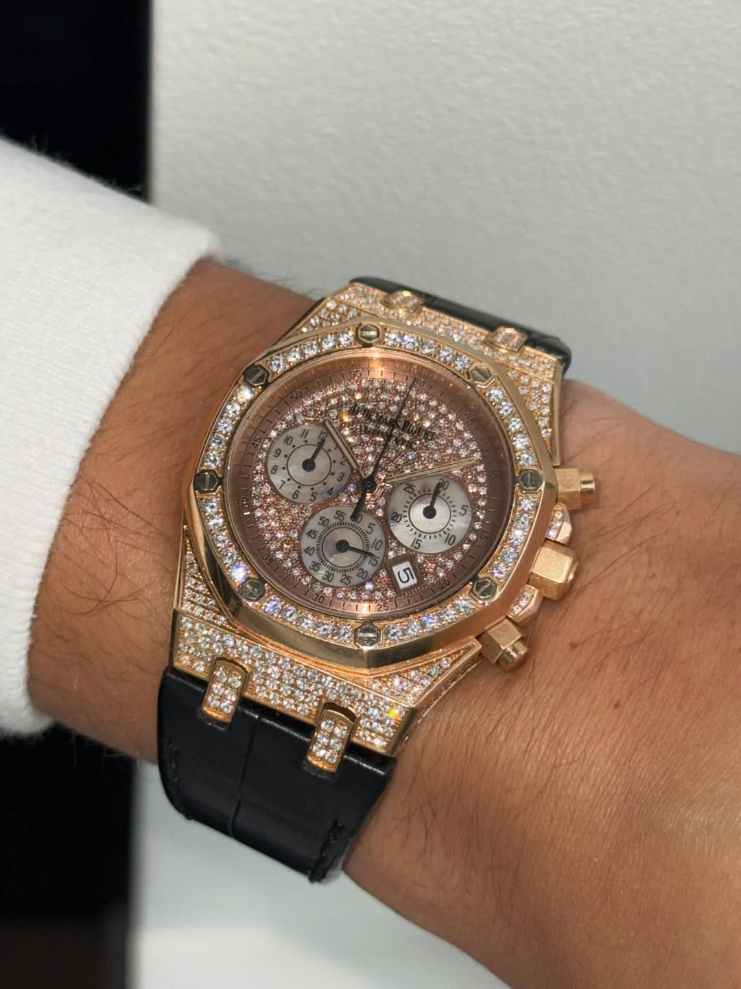 May be an image of wrist watch and text