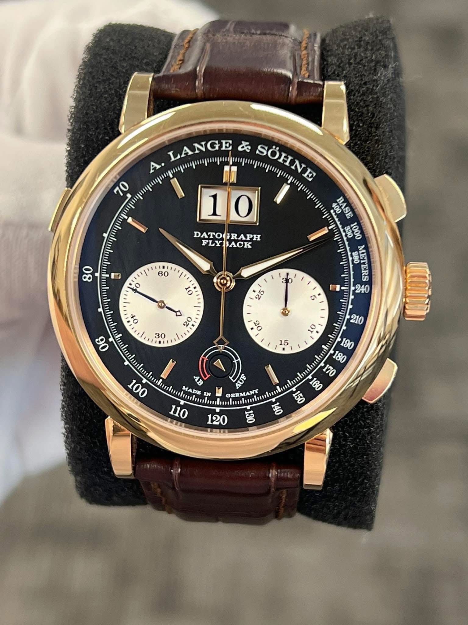 May be an image of wrist watch and text that says '70 LANGE ど SÖHNE A. 10 AToOapu FLYBACK 80 10I 60 D AE4K SS 0000 SAASSN o 25 公 20 30 ® 06 50 ٥ 15 oot E HO 1B MADE IN N Οπι…