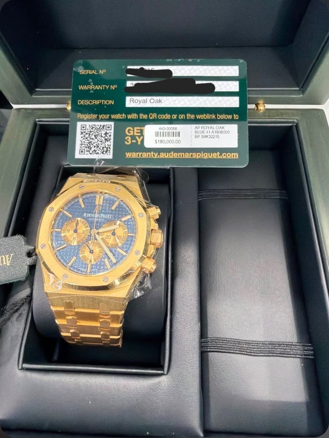 May be an image of wrist watch and text that says 'SERIAL N WARRANTY N DESCRIPTION Royal Oak Register your watch with the QR code or on the weblink below to IIHI $180,000.00…