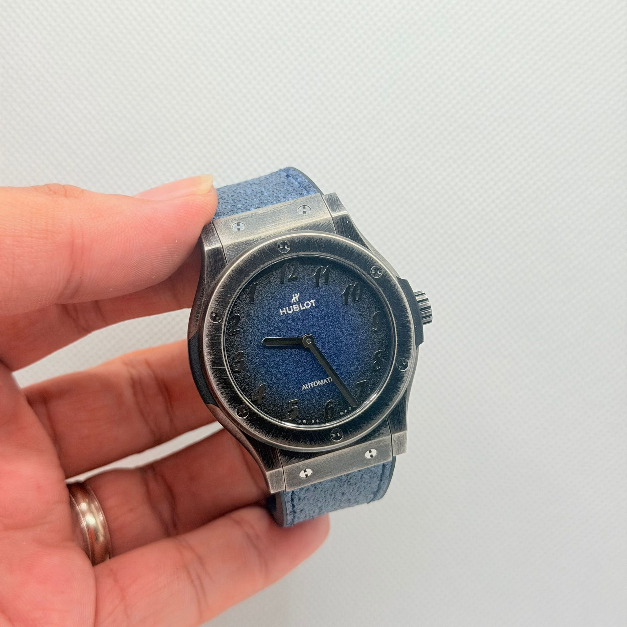 May be an image of digital watch and text
