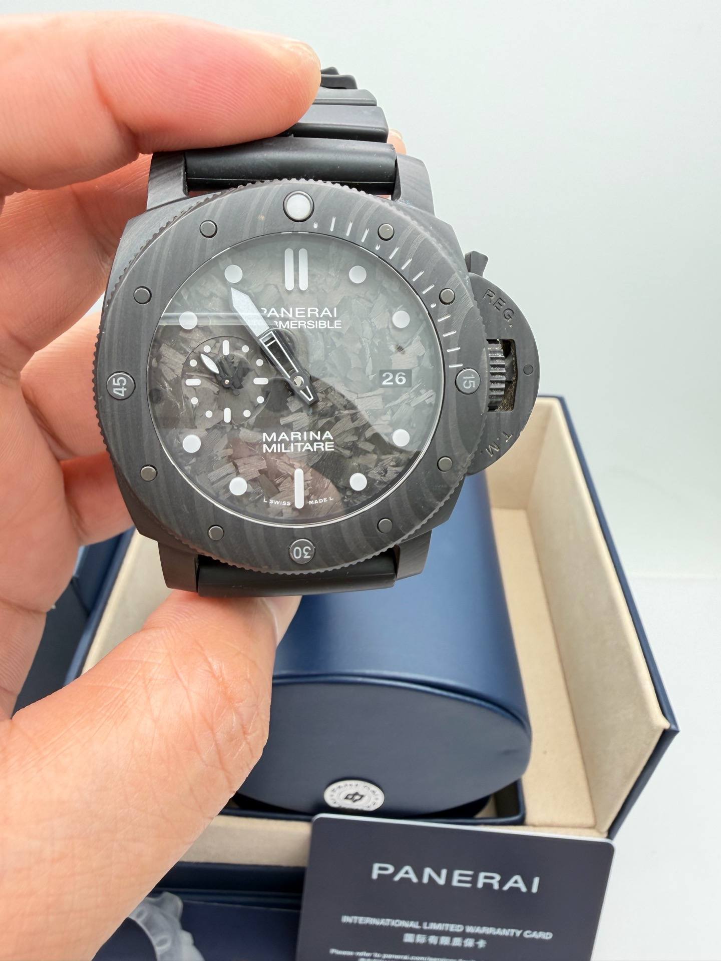 May be an image of wrist watch and text