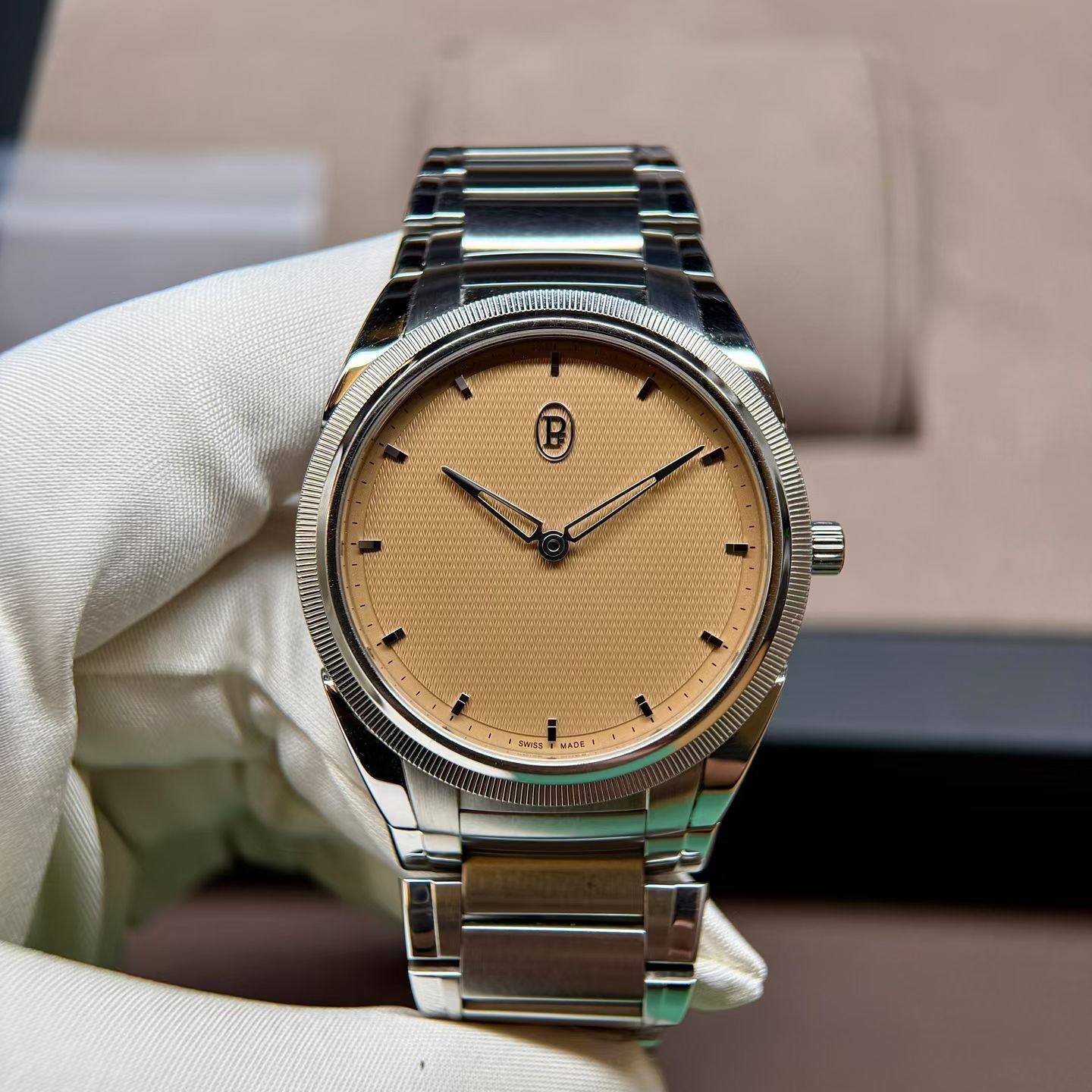 May be an image of wrist watch and text