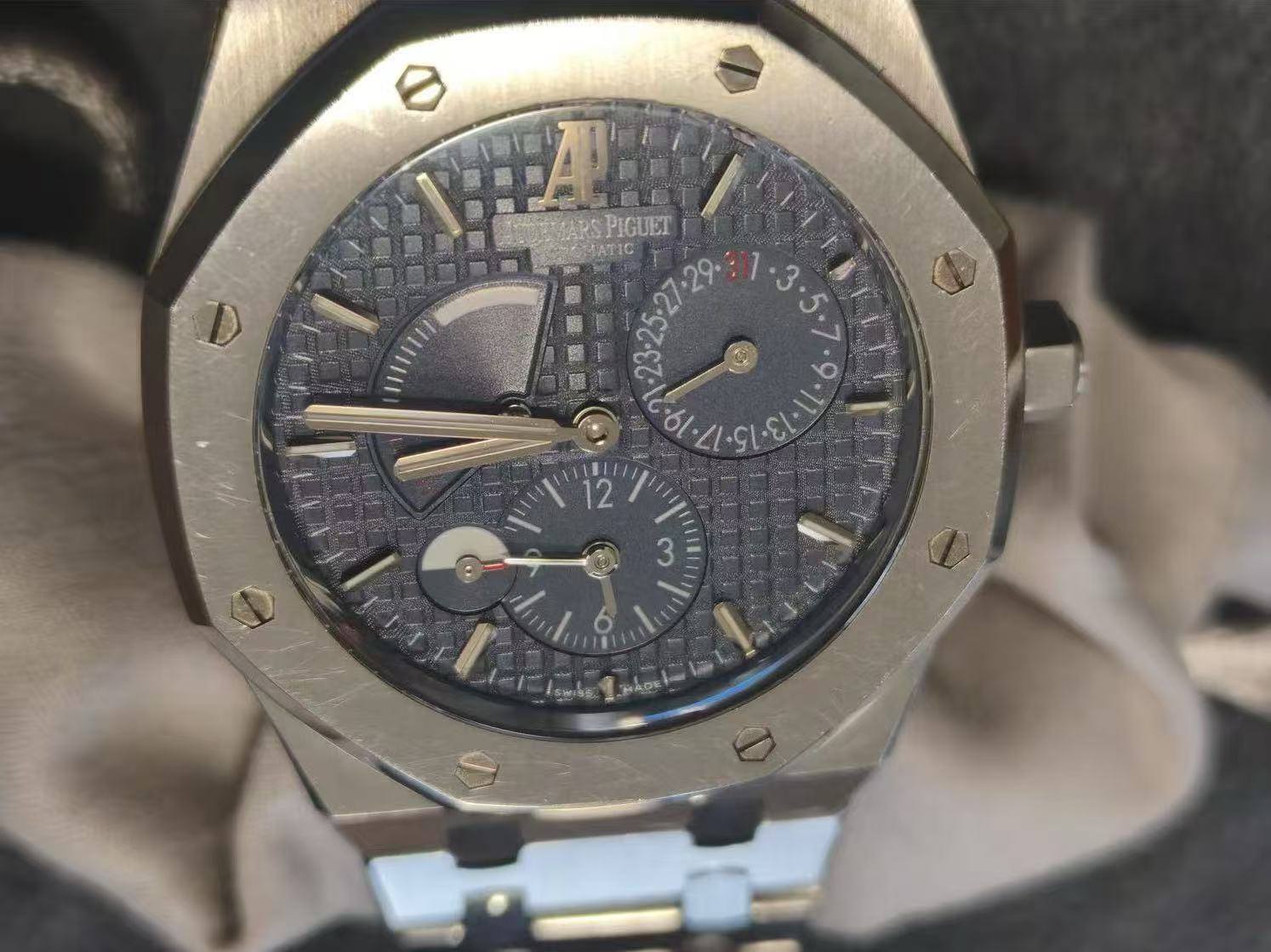 May be an image of wrist watch and text