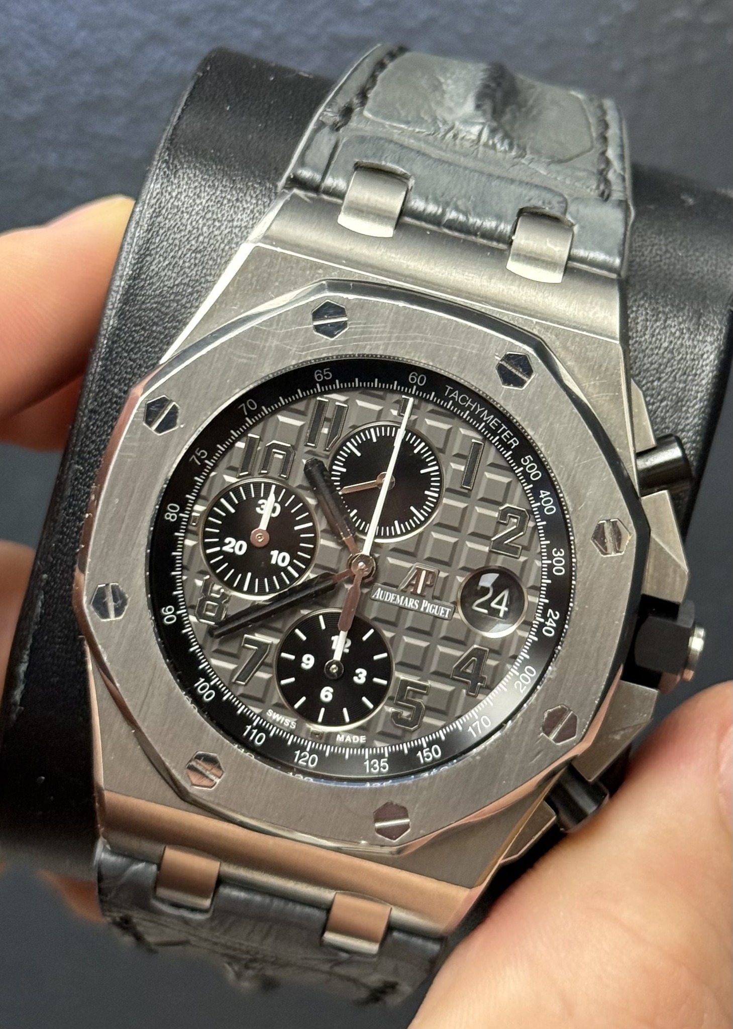 May be an image of wrist watch and text