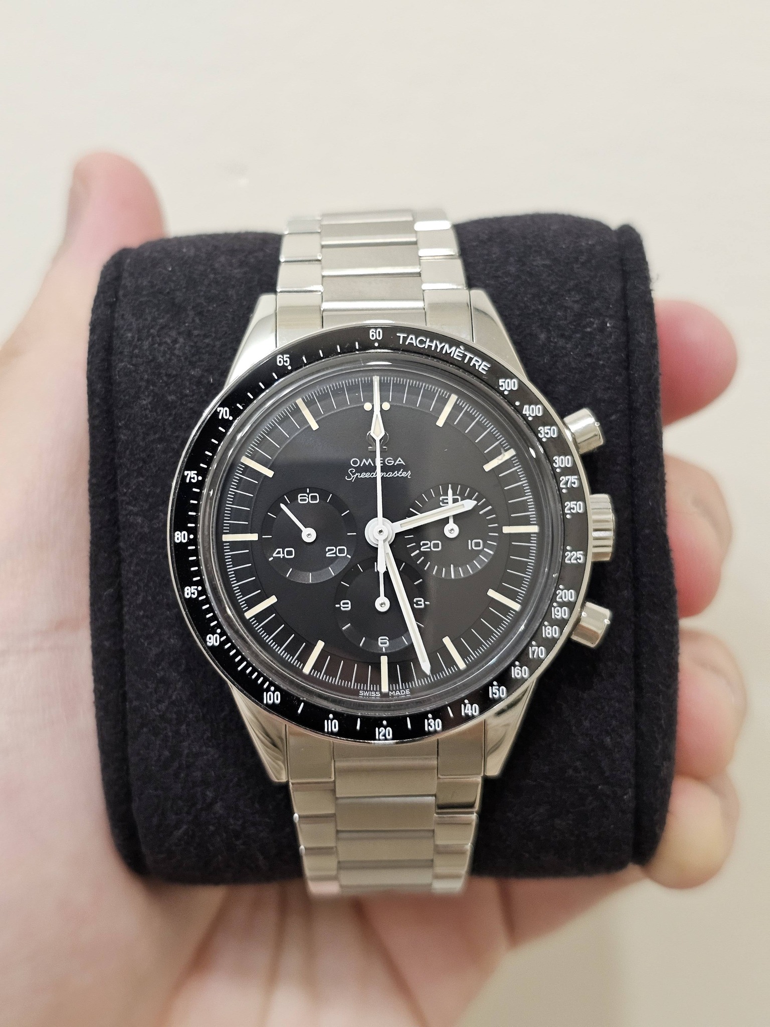 May be an image of wrist watch and text