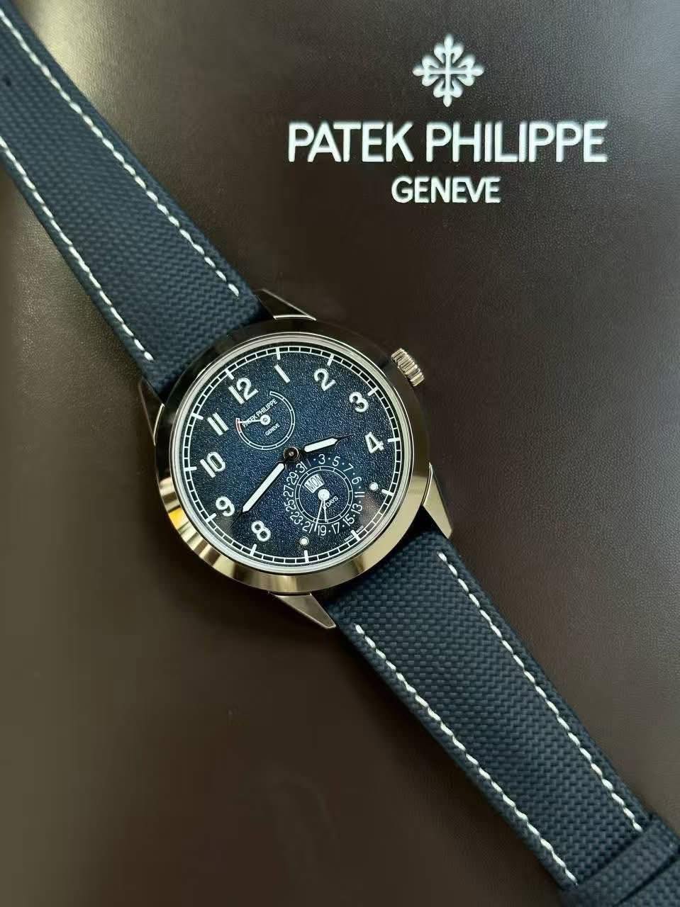 May be an image of wrist watch and text that says 'PATEK PHILIPPE GENEVE -I IRI 2 က ব 12 APE 0 soev 1 טפל 10 9 8 0 วิ่ว S ንንደ וה 2 S D'