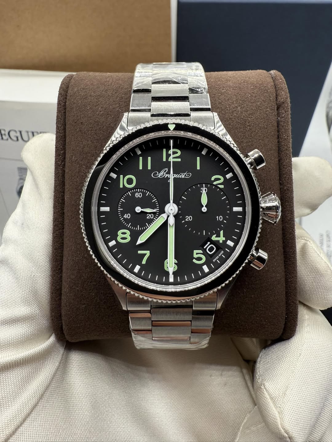 May be an image of wrist watch and text