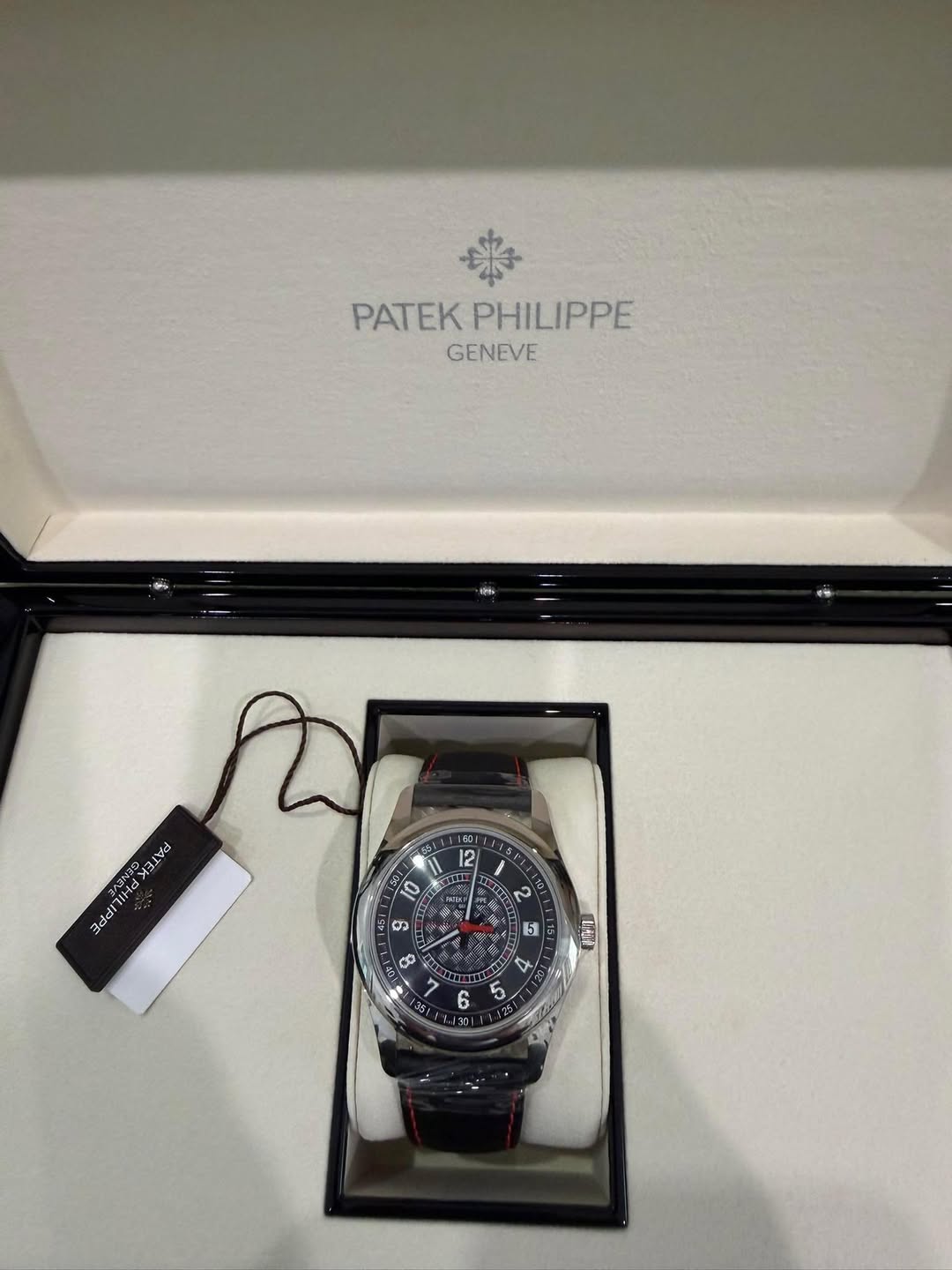 May be an image of wrist watch and text
